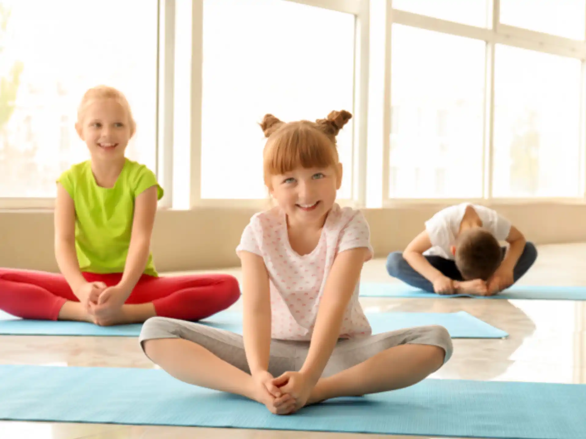 a group of children sitting on the floor