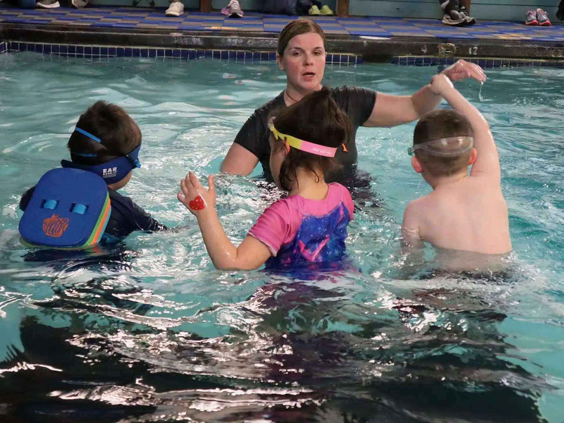 a group of people in a pool