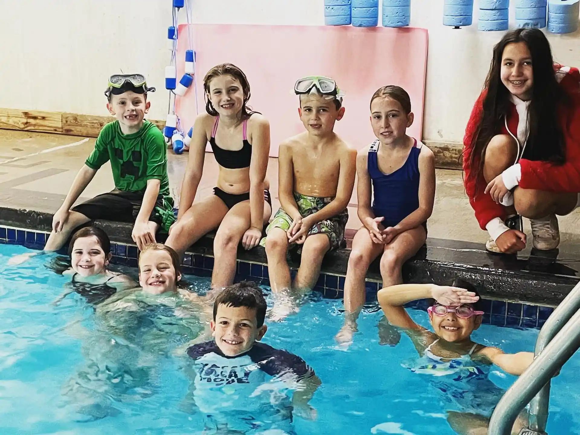a group of people in a pool
