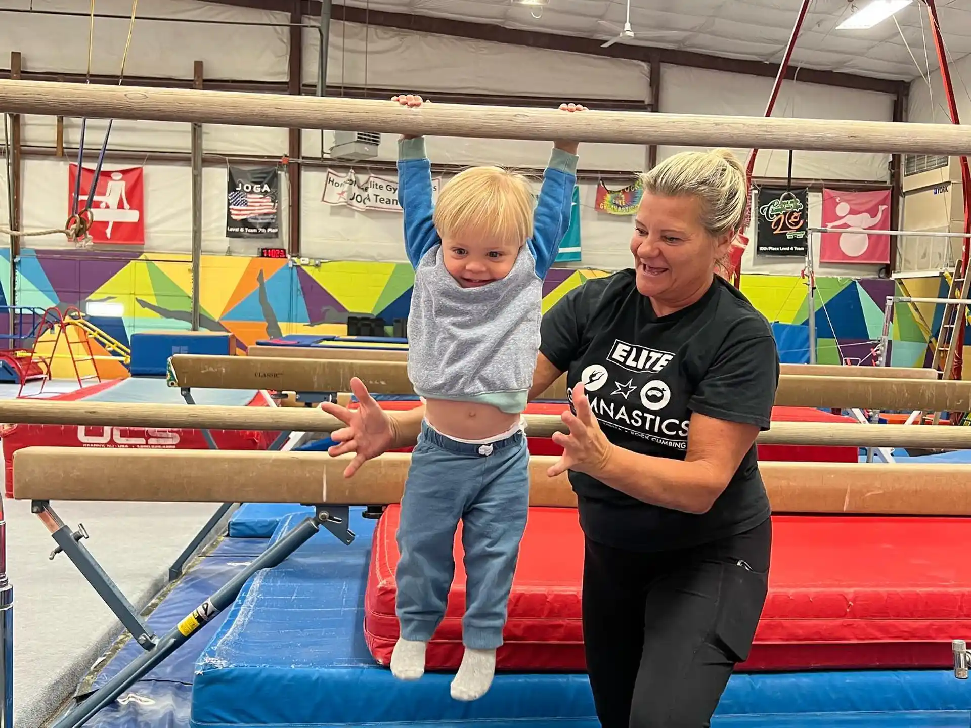 a person and a child posing for the camera
