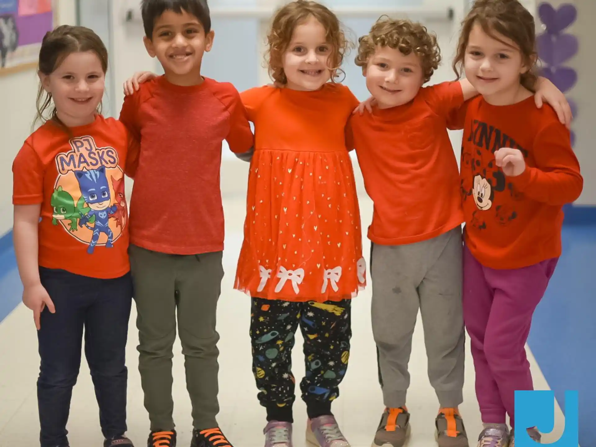 a group of children posing for a photo