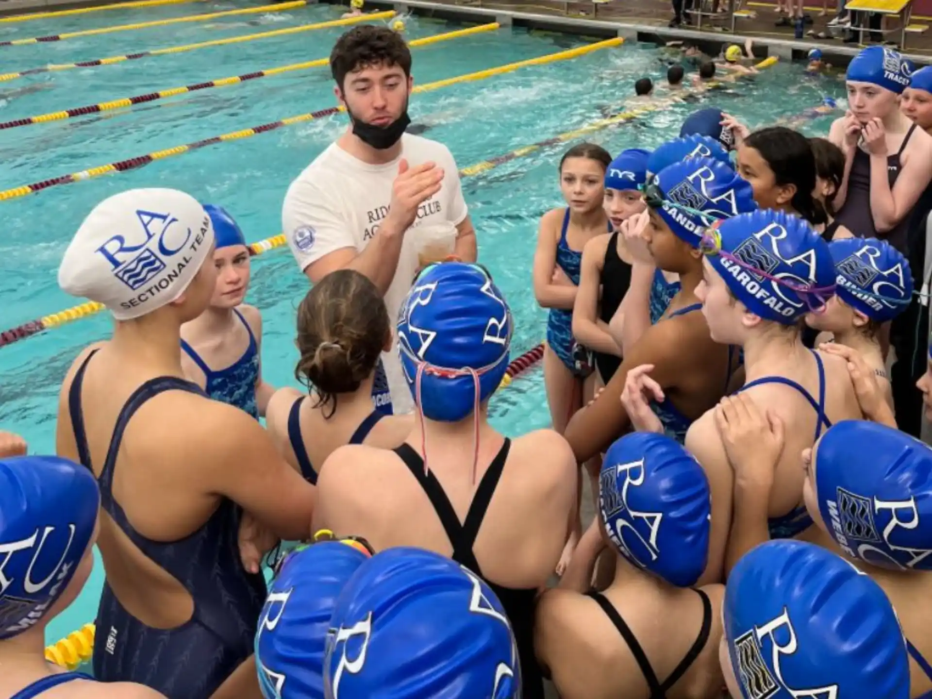 a group of people in a pool