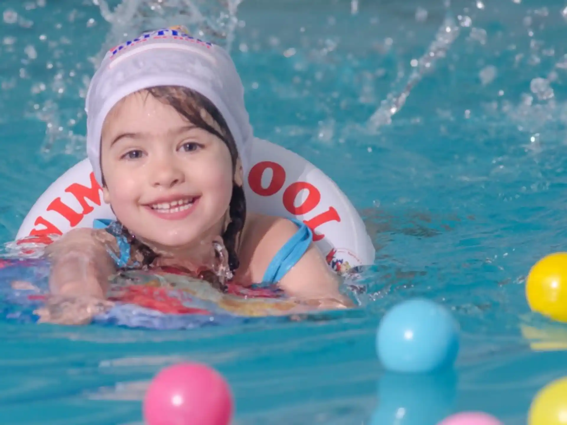a girl in a pool