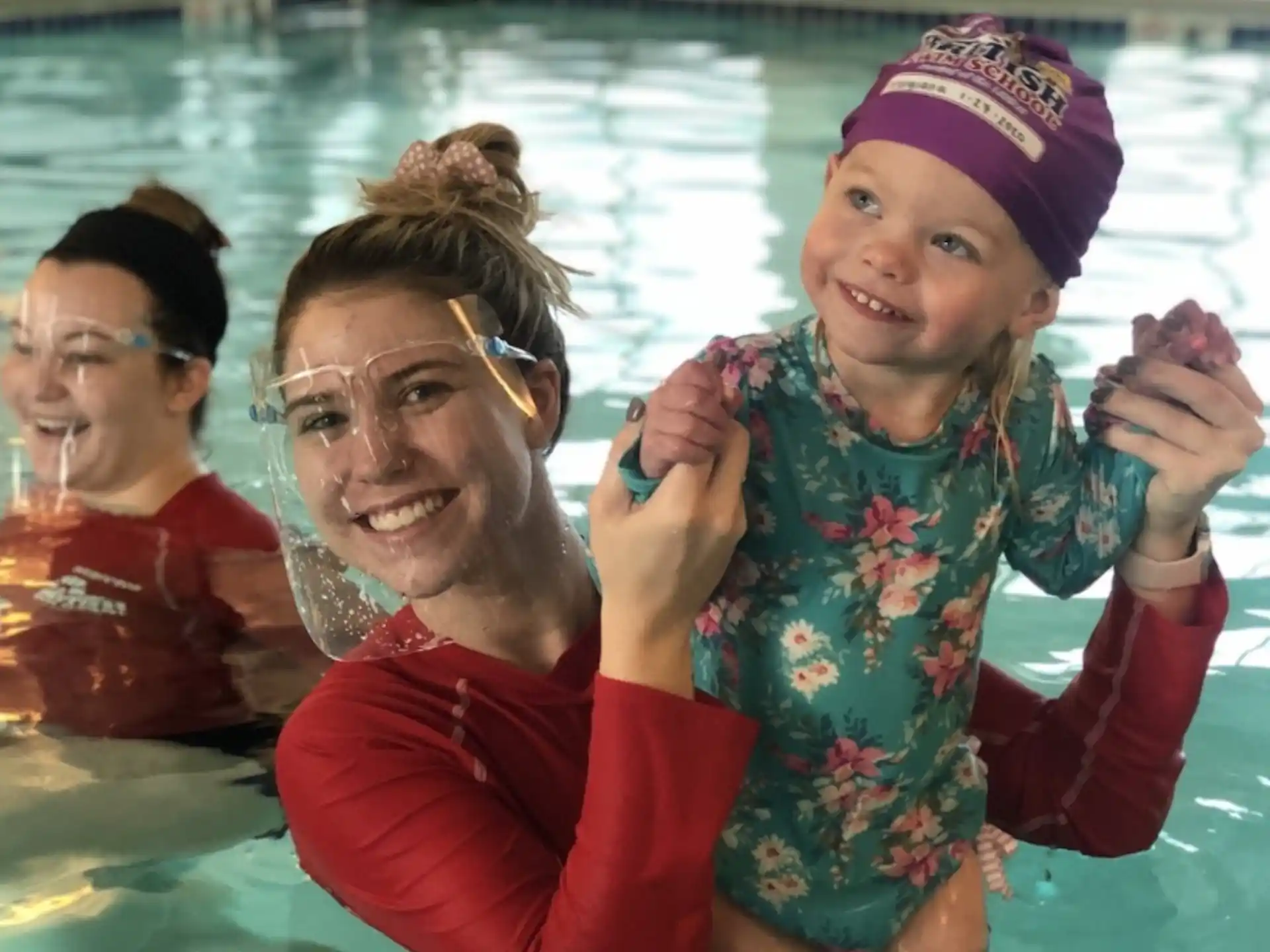 a group of people in a pool