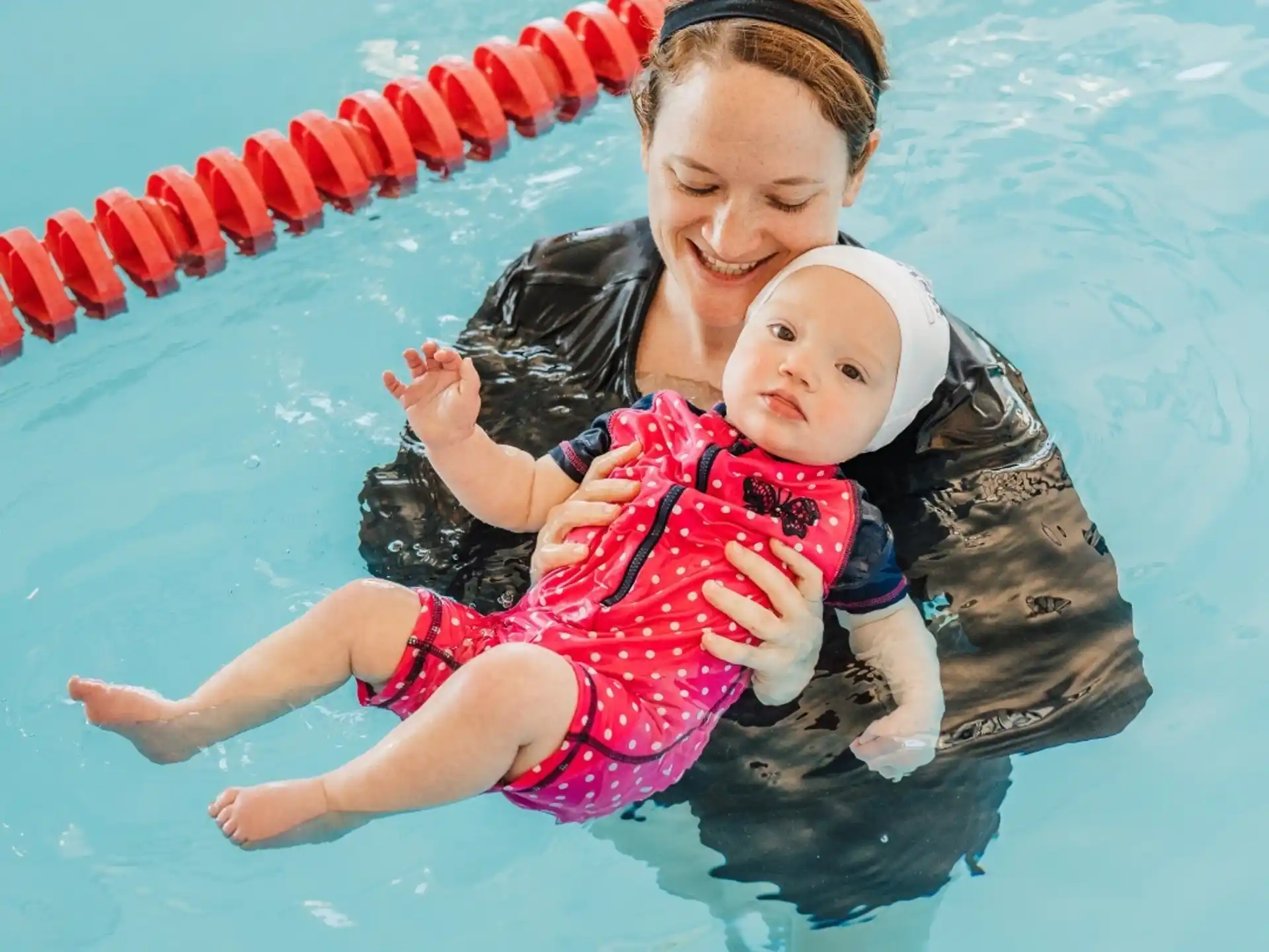 a person holding a baby