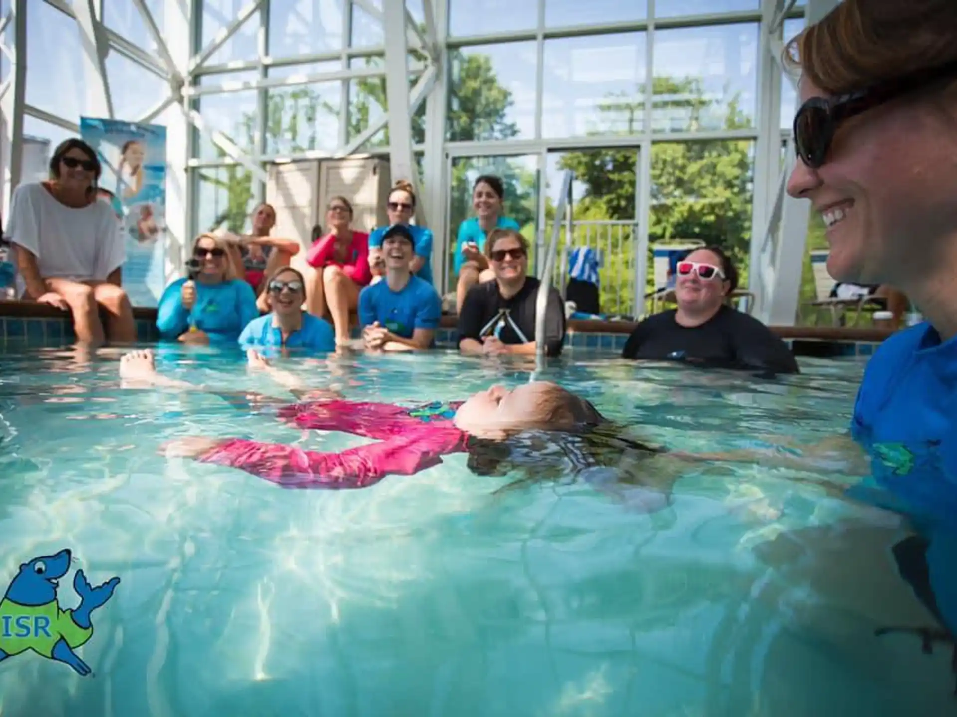 a group of people in a pool