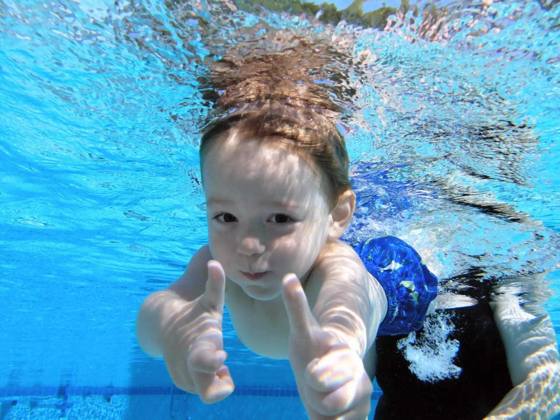 a baby in a pool
