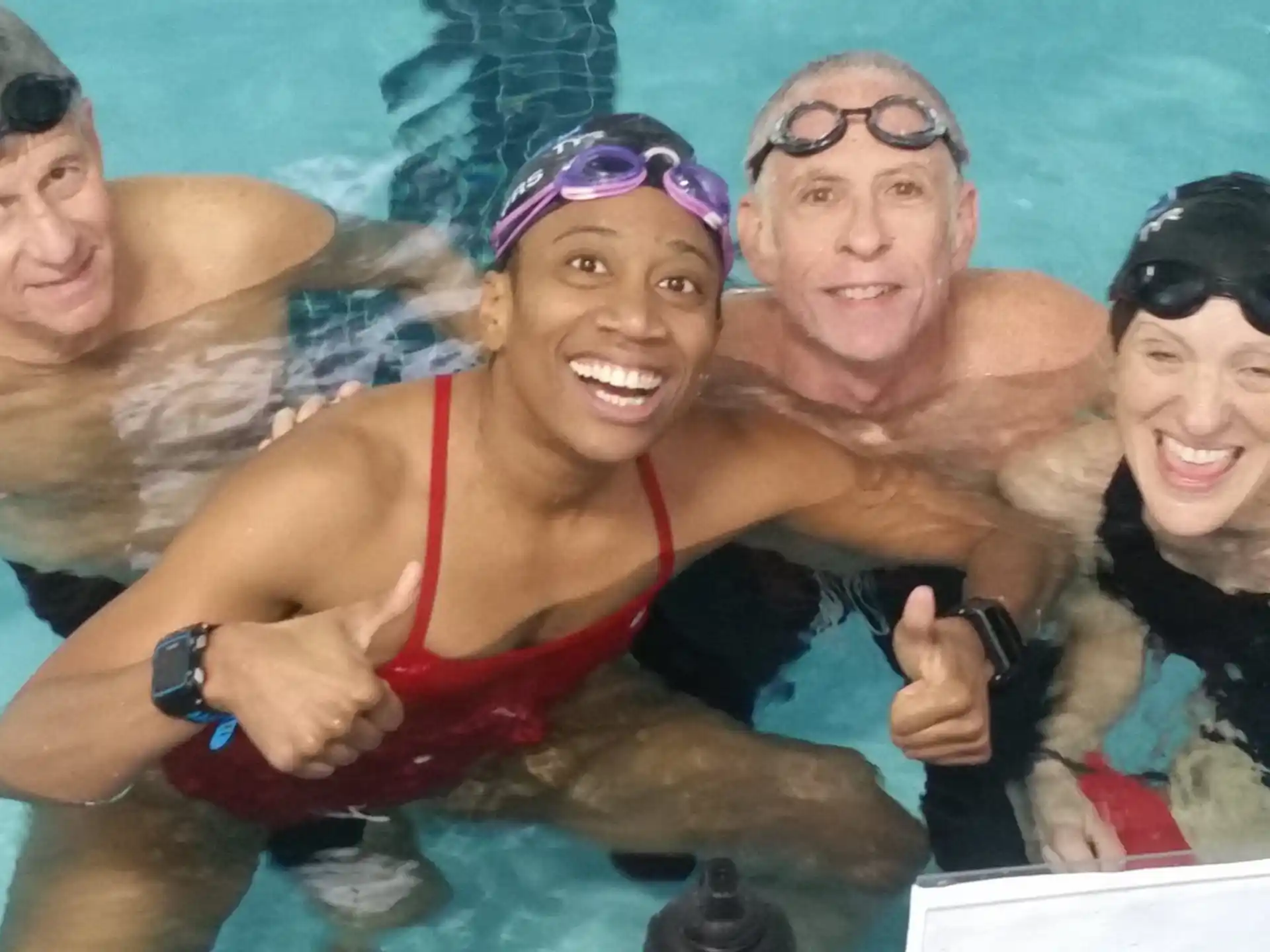 a group of people in a pool