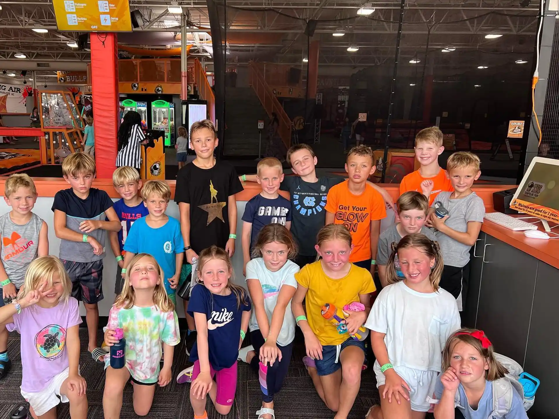 a group of children posing for a photo