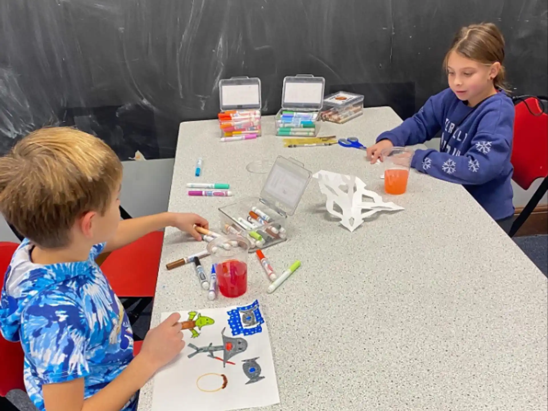 children sitting at a table