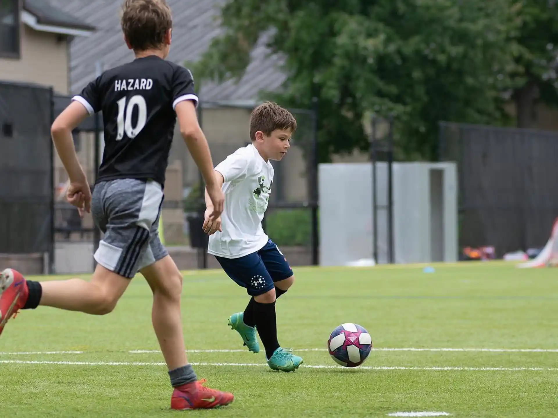 a couple of boys playing football