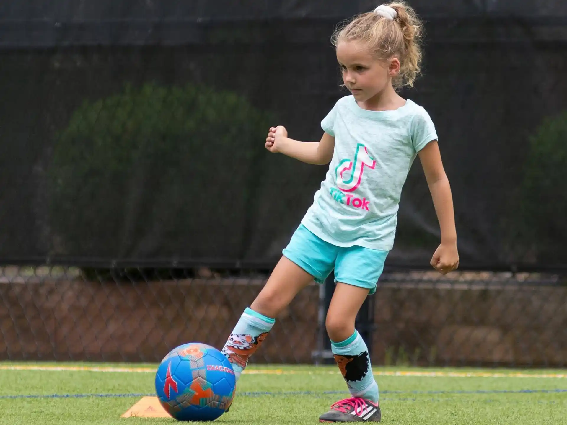 a girl playing football