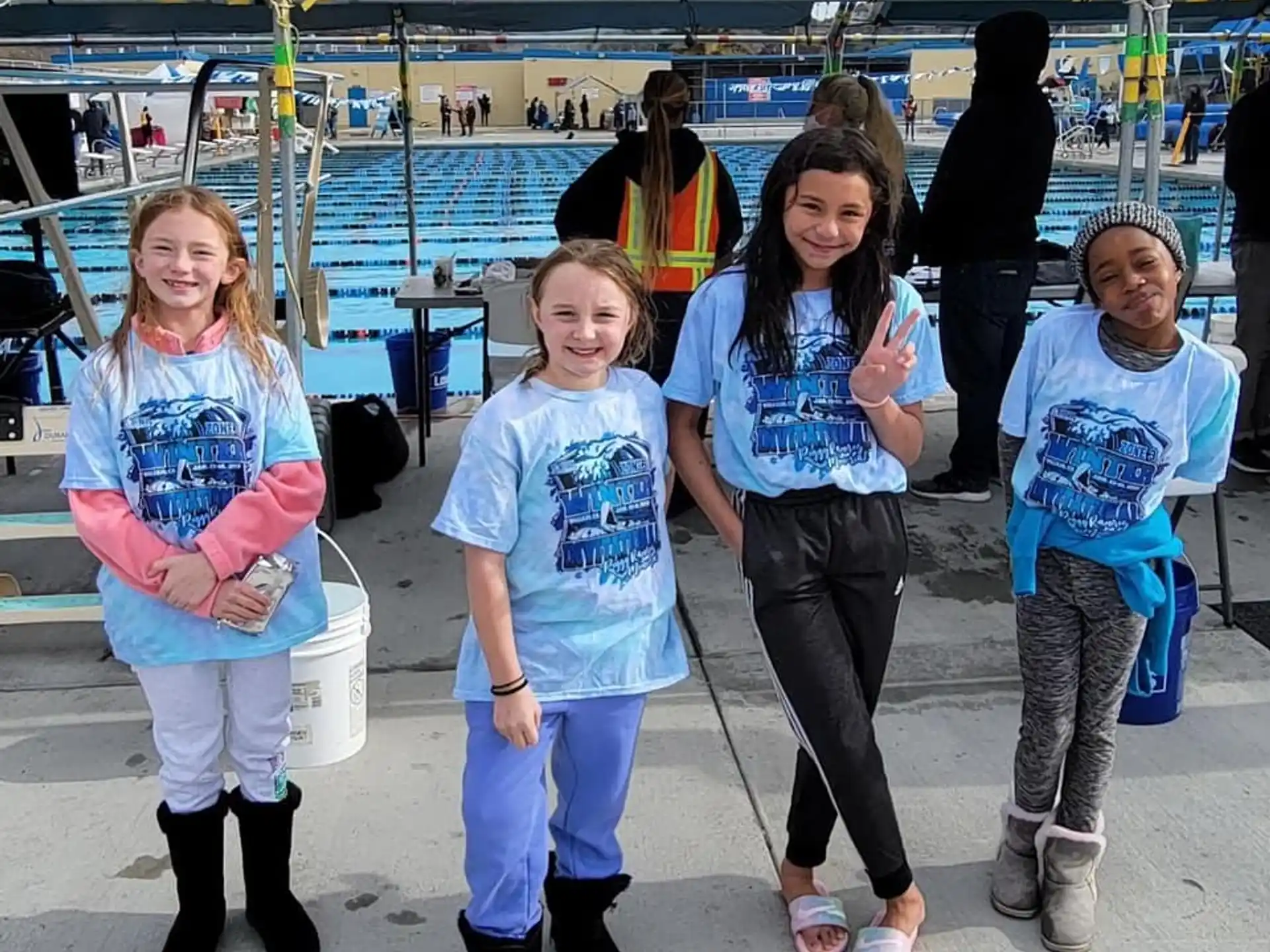 a group of girls posing for a photo