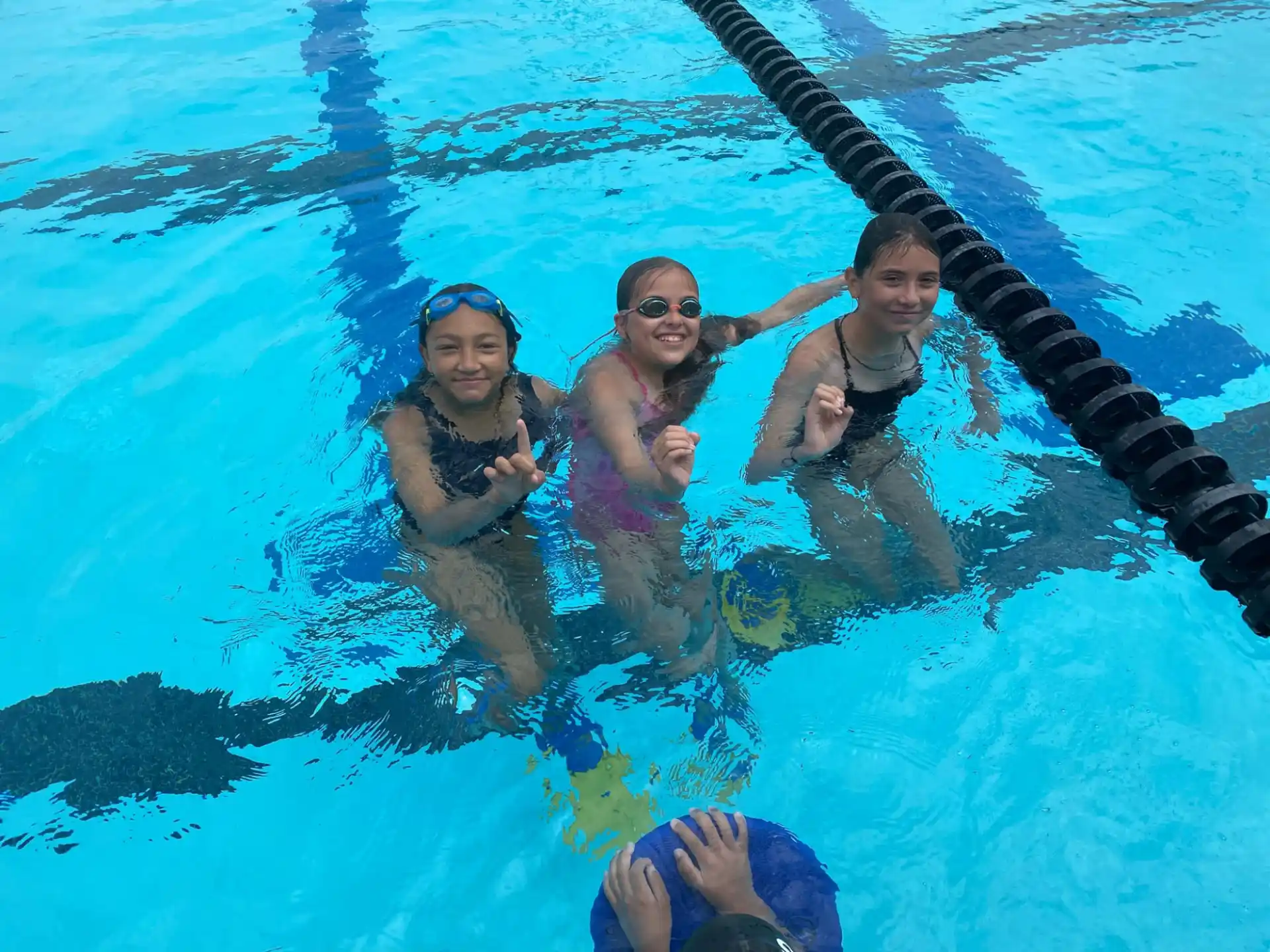 a group of people in a pool