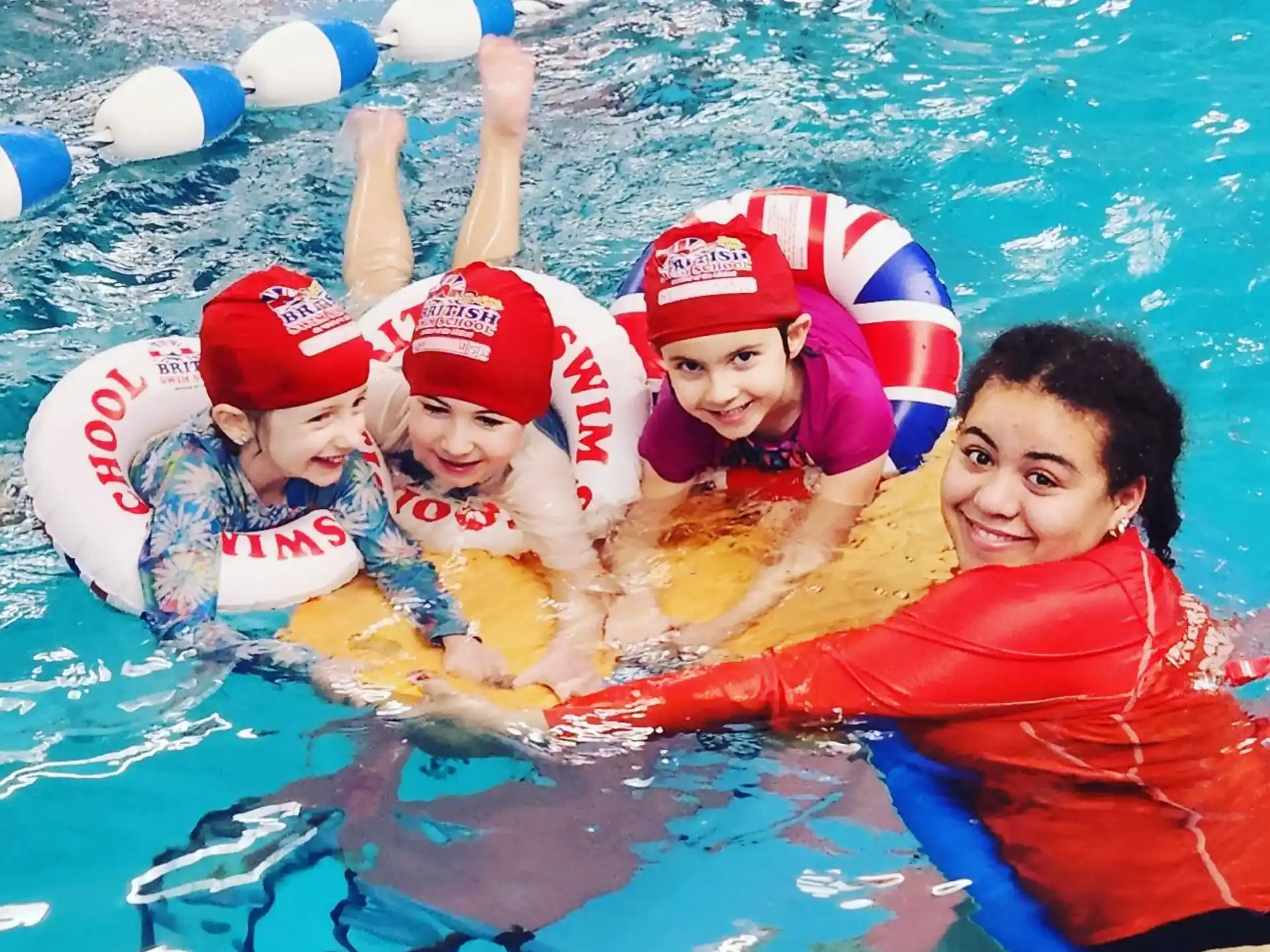 a group of people in a pool