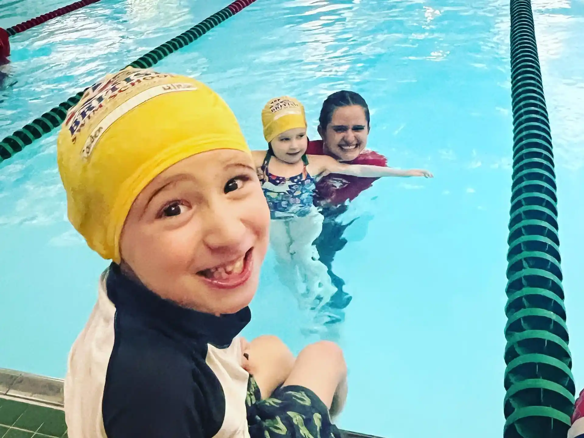 a group of people in a pool