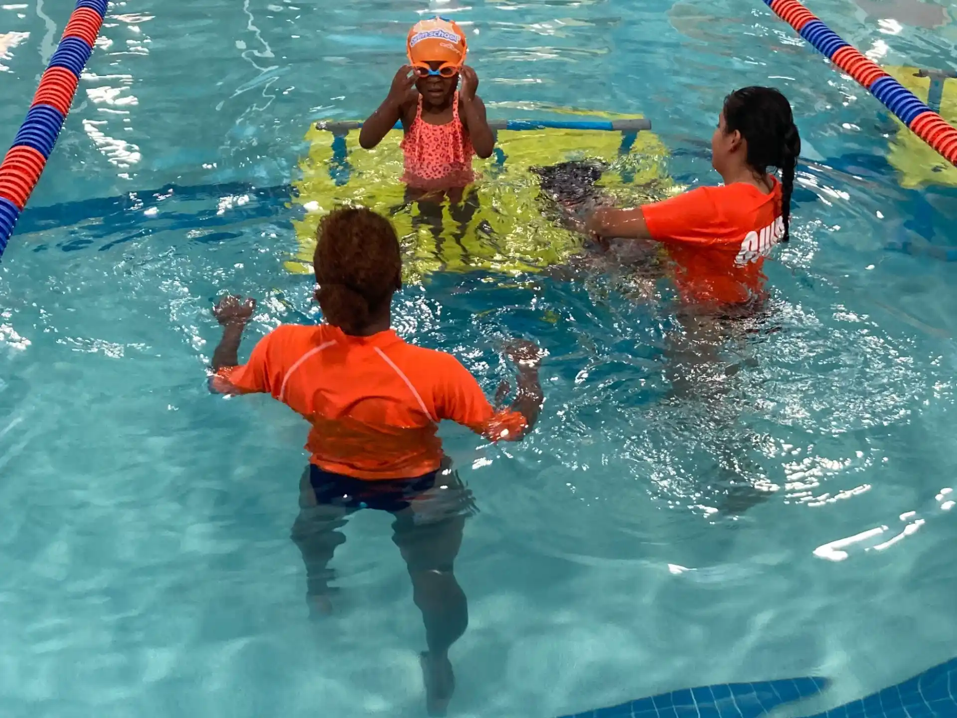 a group of people in a pool
