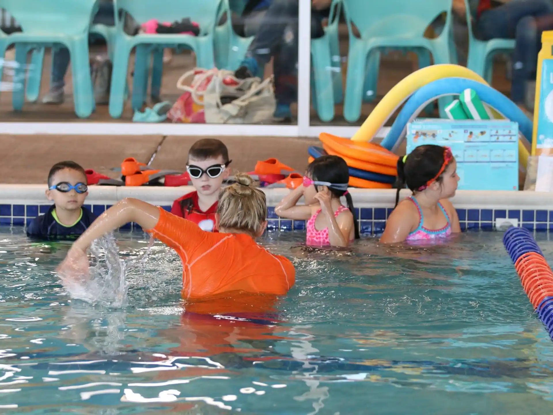 a group of people in a pool