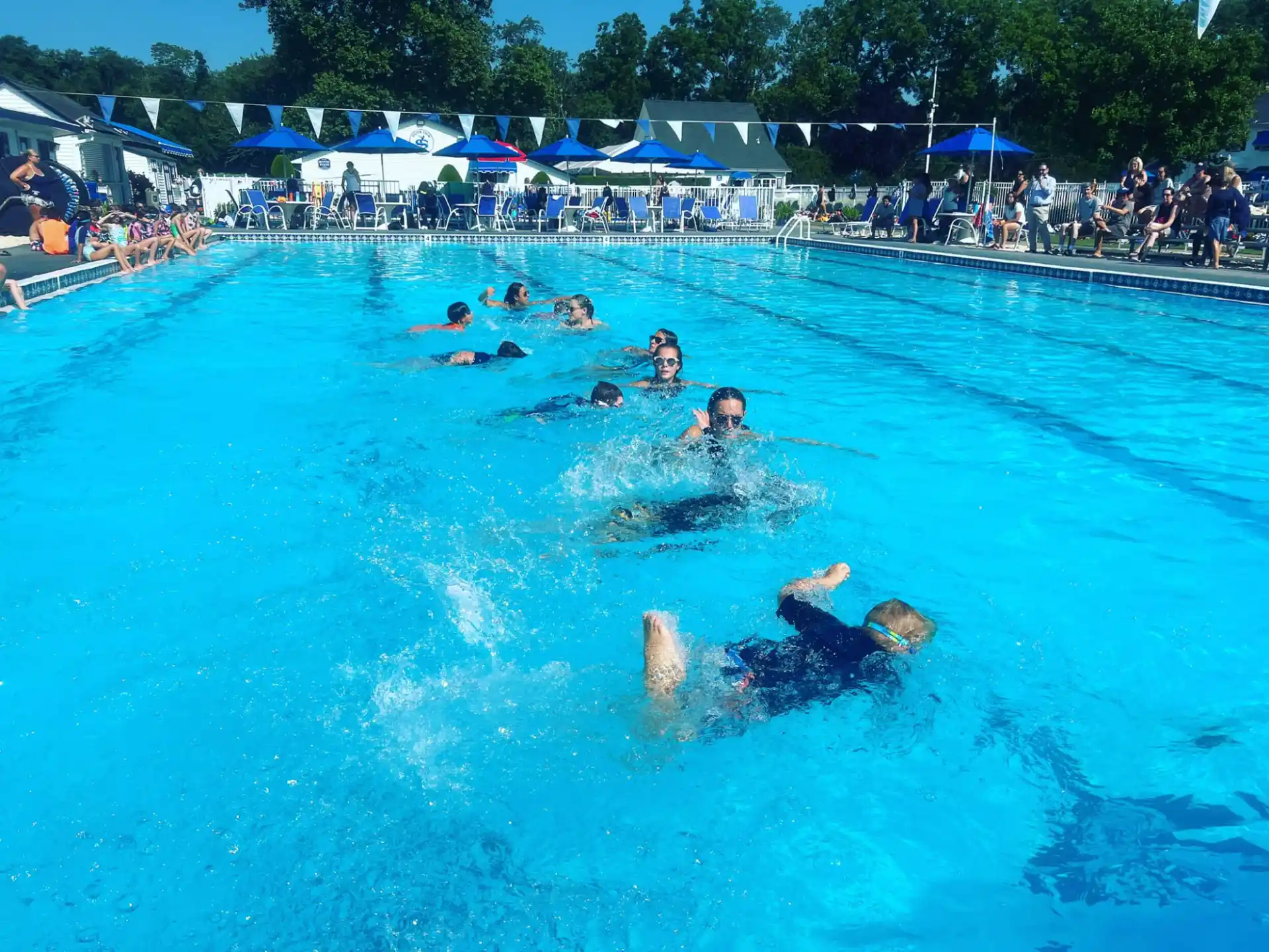 a group of people in a pool