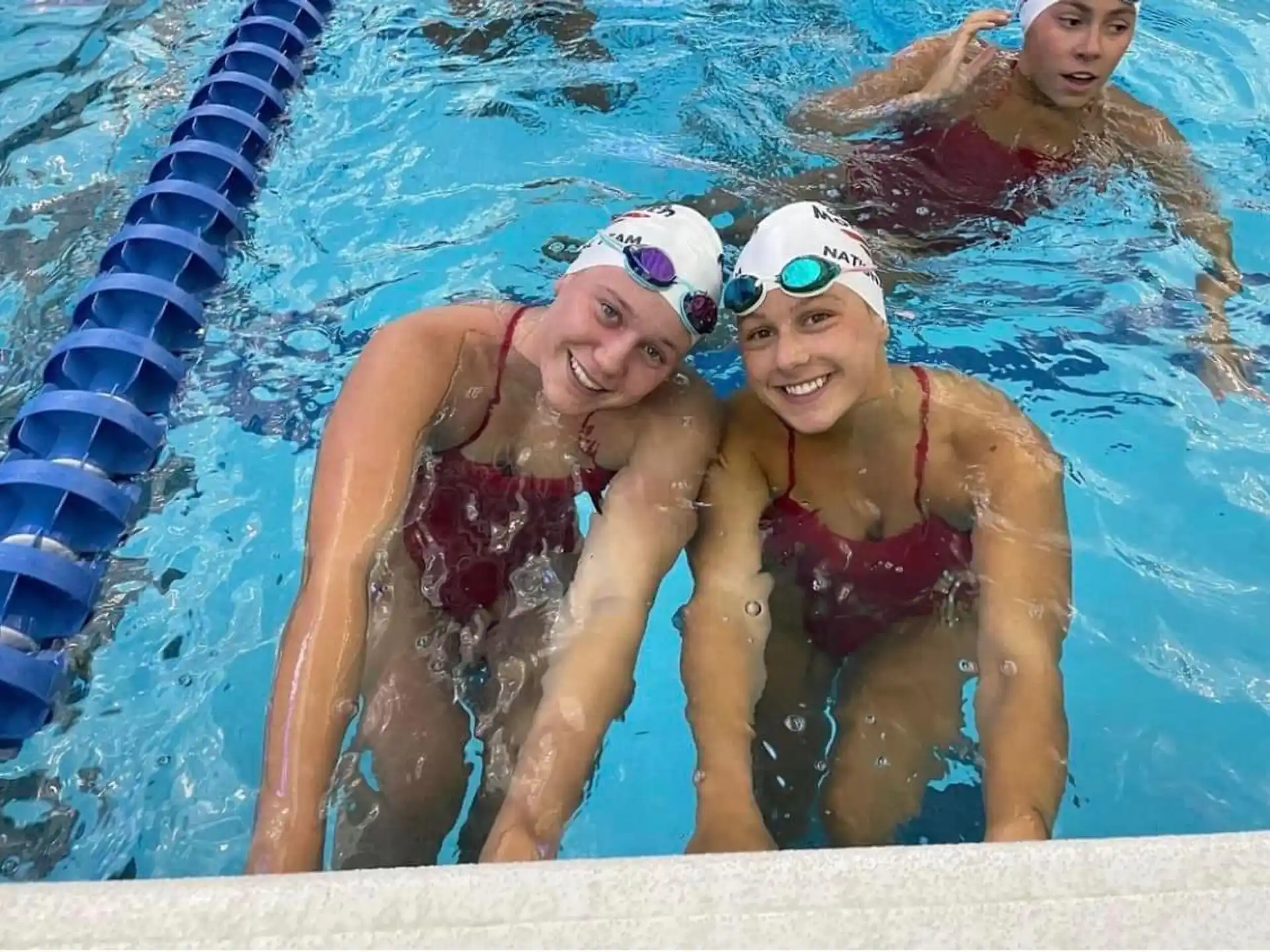 a group of people in a pool