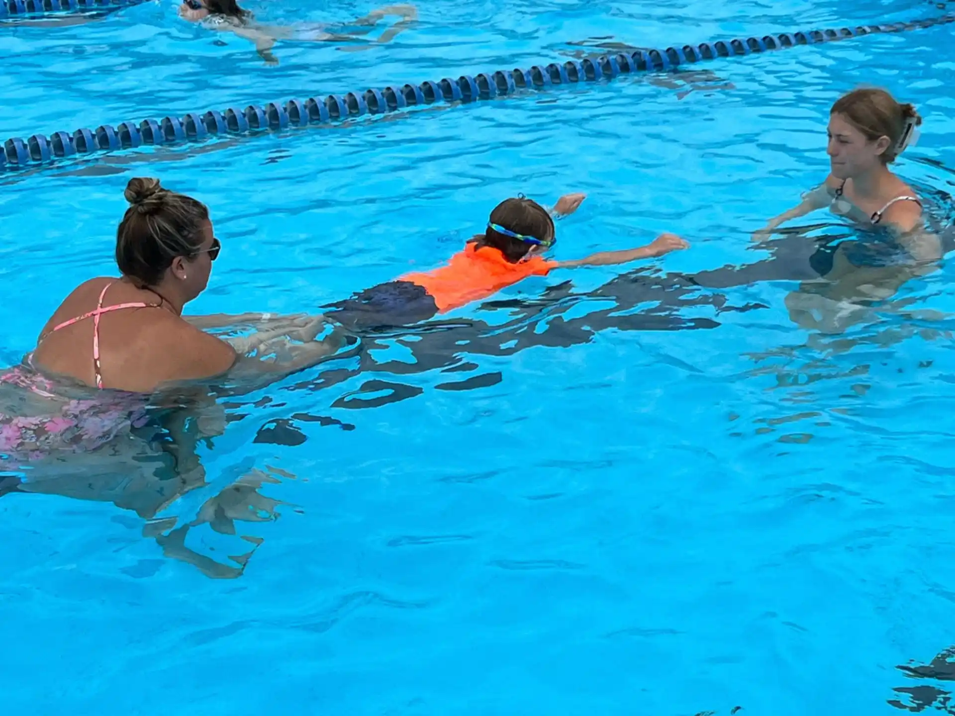 a group of people in a pool