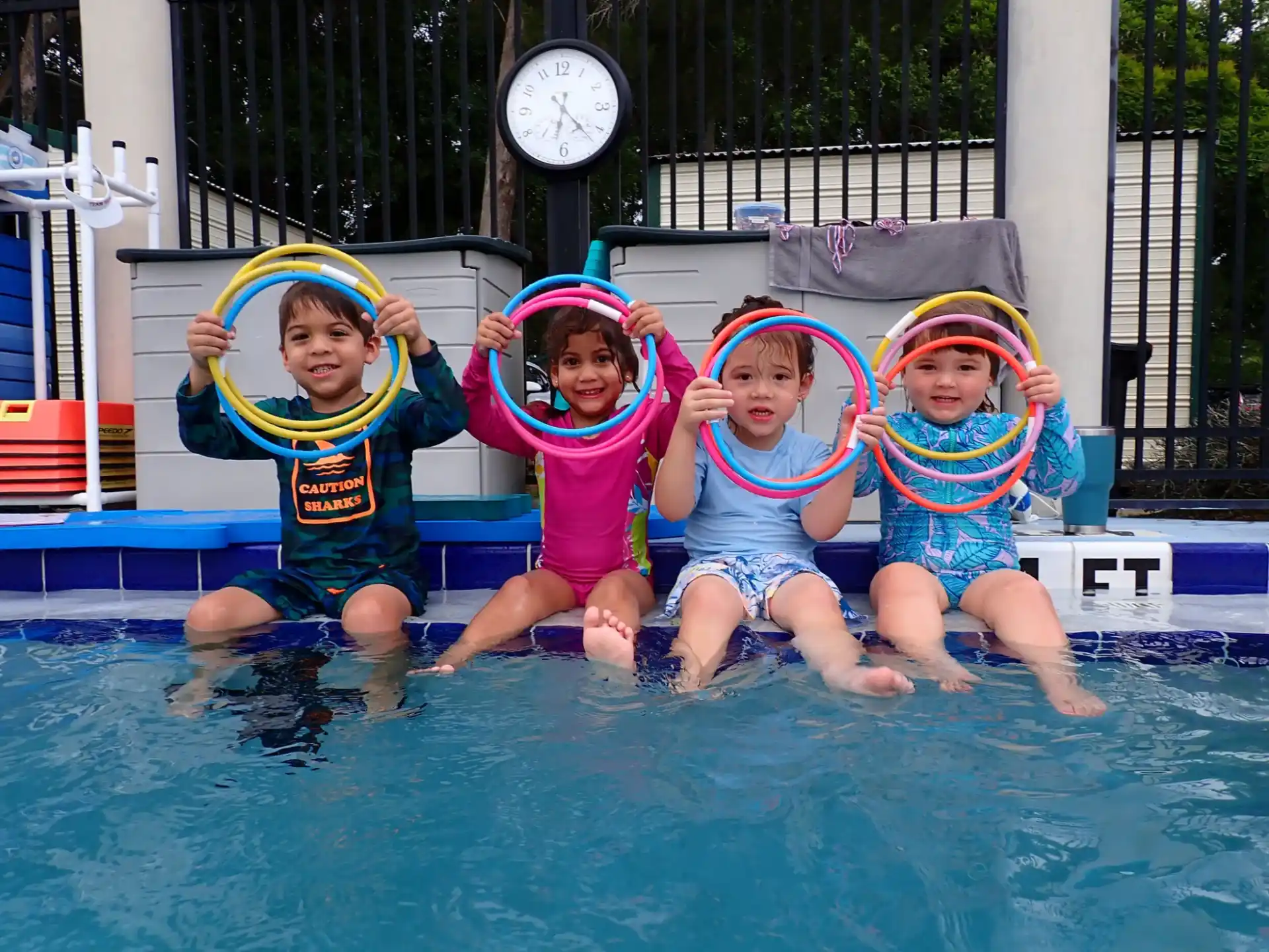 a group of children in a pool