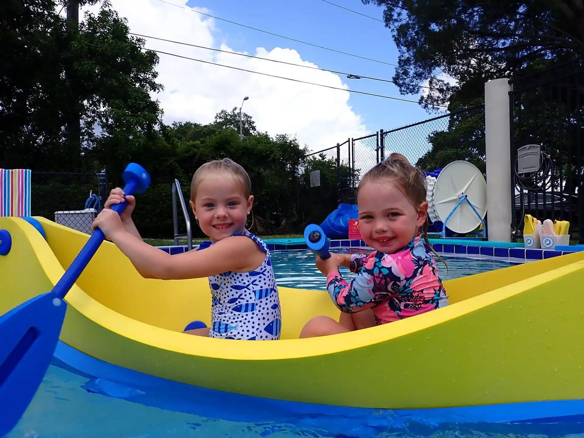 two kids in a pool