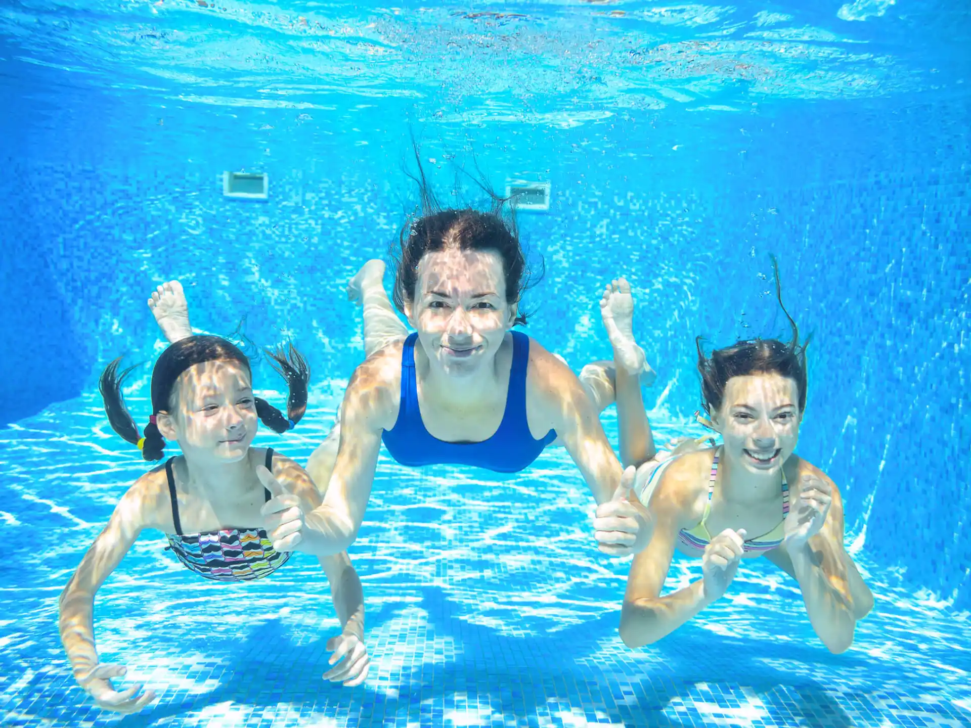 a group of people in a pool