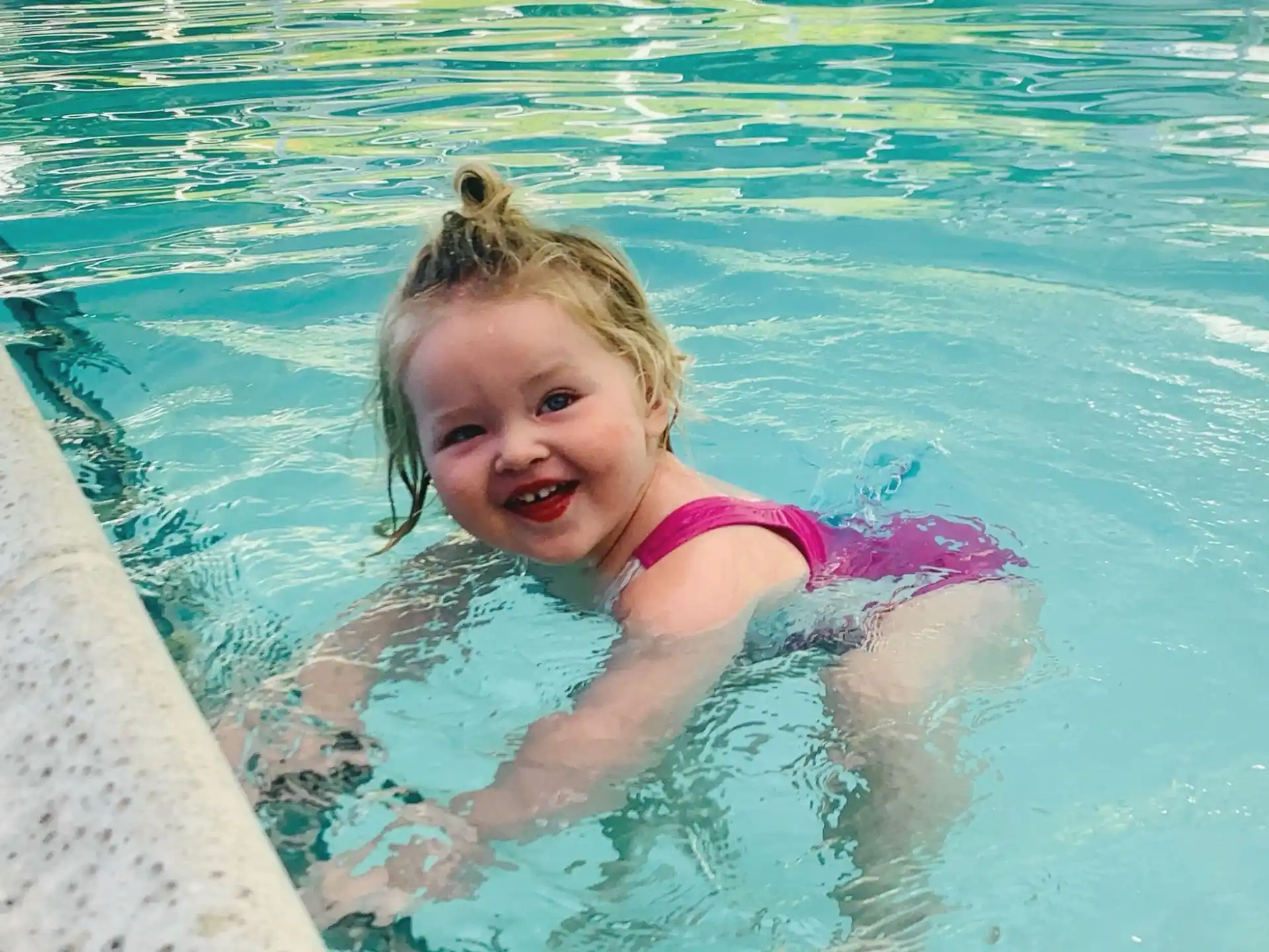 a girl in a pool