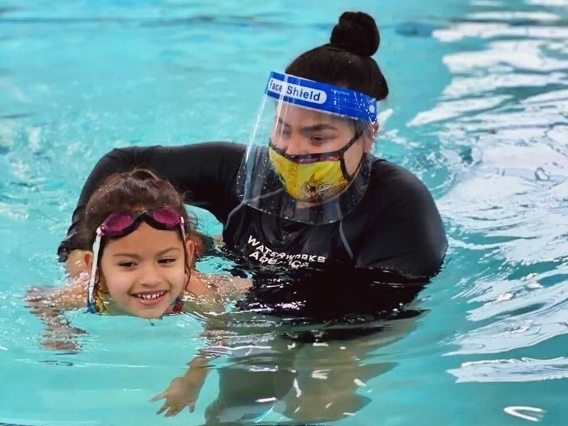 a person and a child in the water