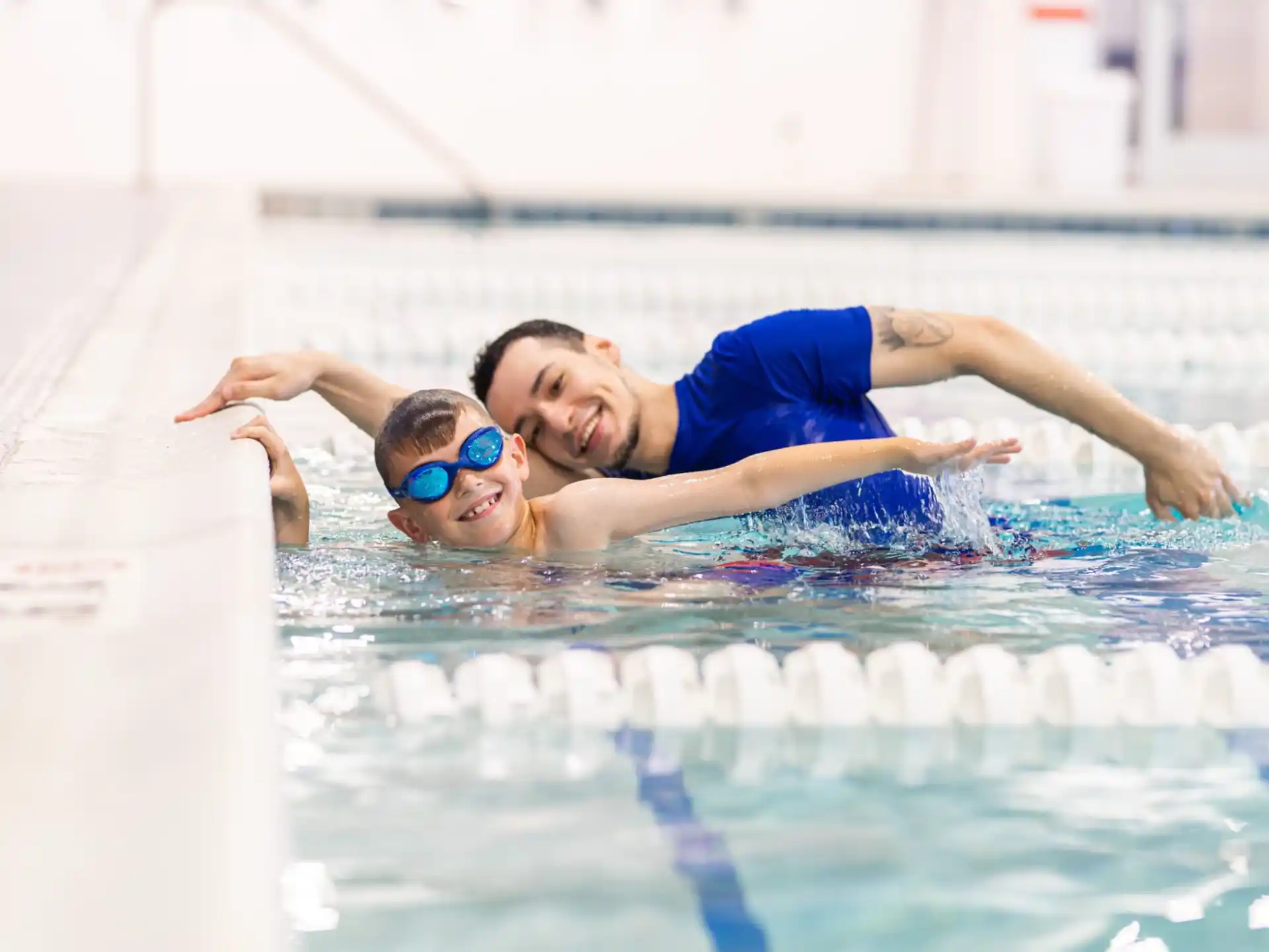 a man and woman in a pool