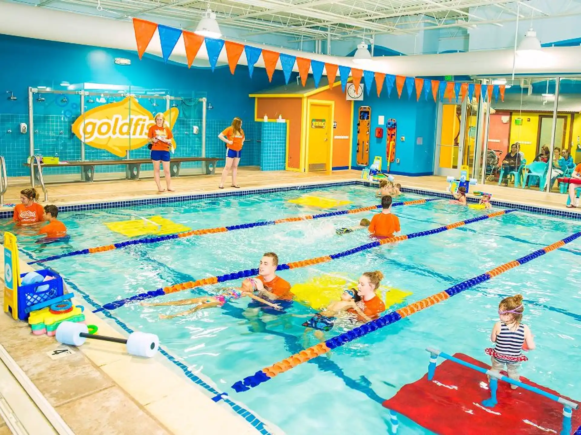 a group of people in a swimming pool