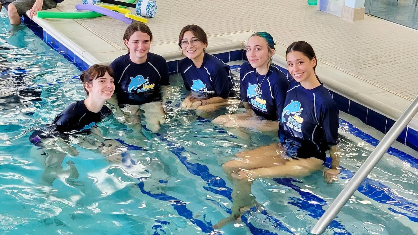 a group of people in a pool