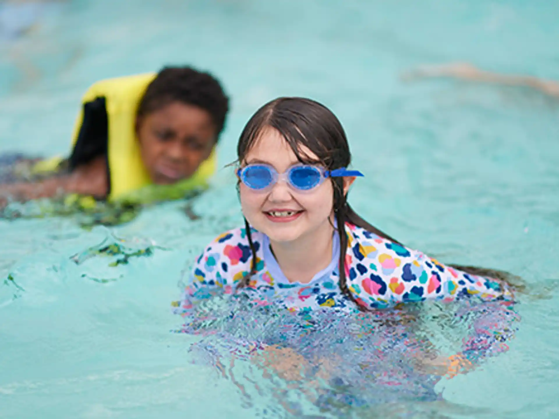 a person and a child in the water