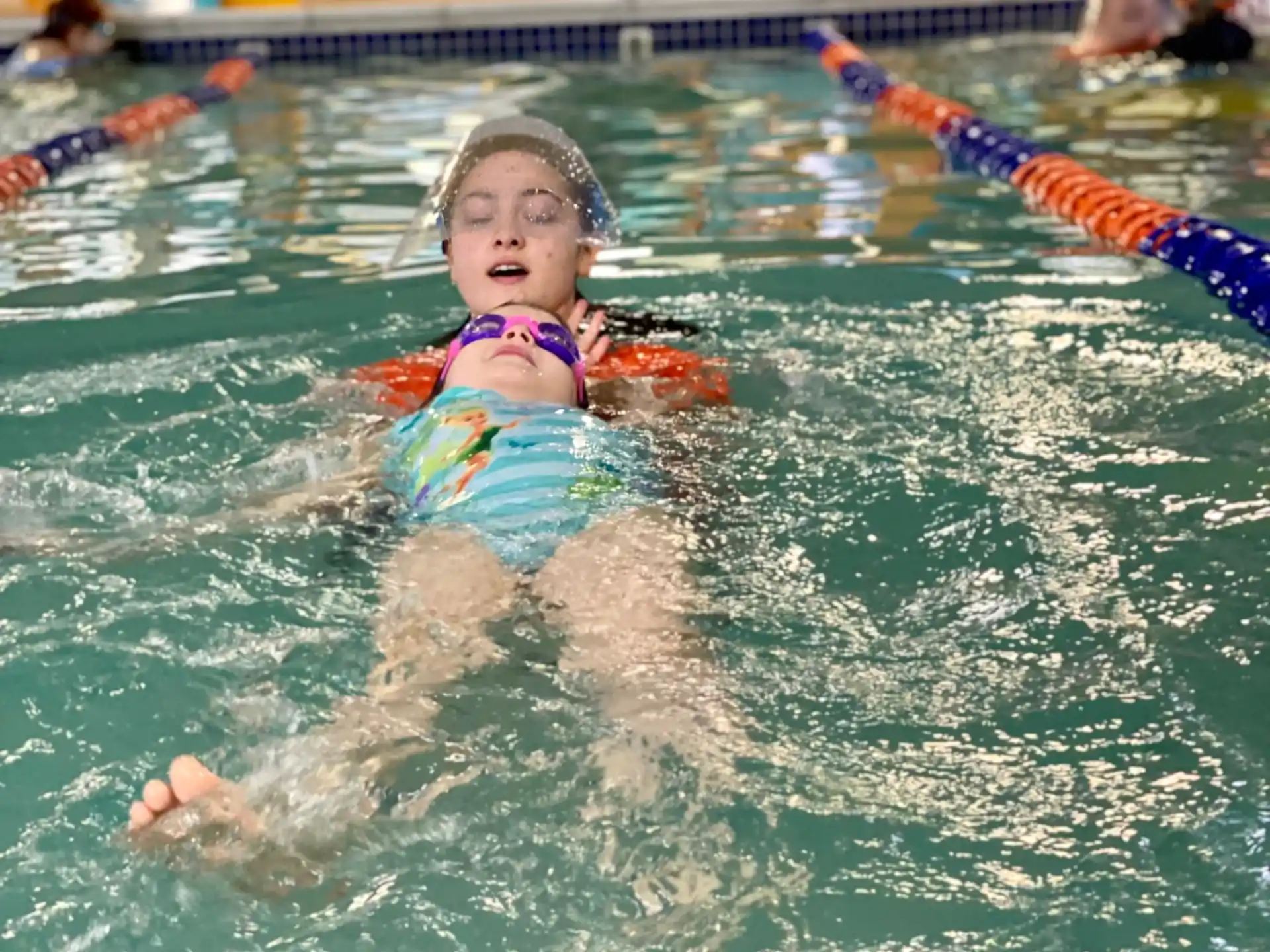 a girl in a pool