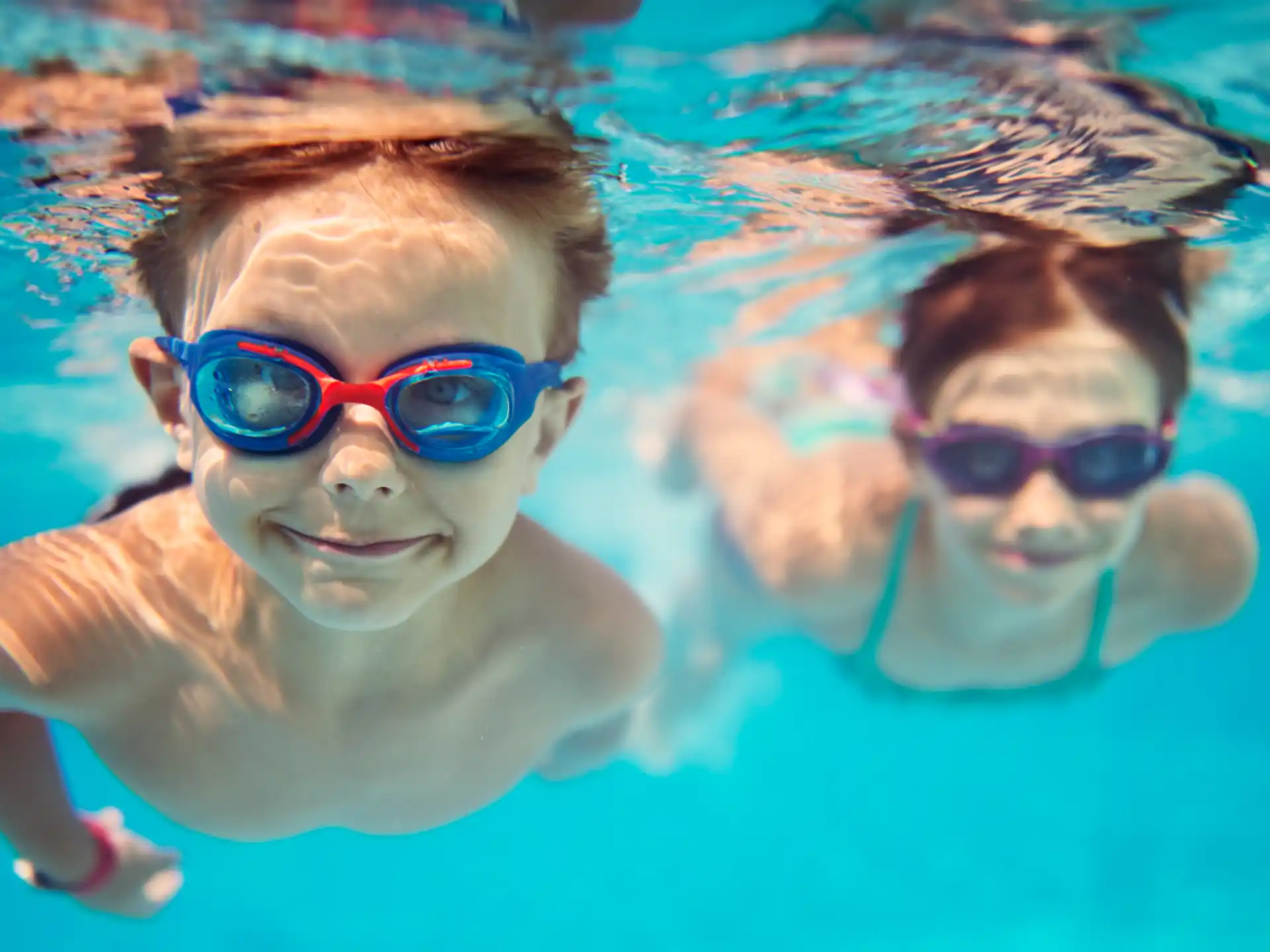 a man and a woman swimming