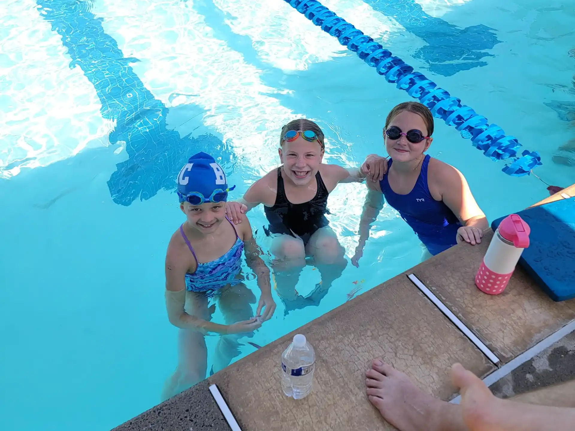 a group of women in a pool