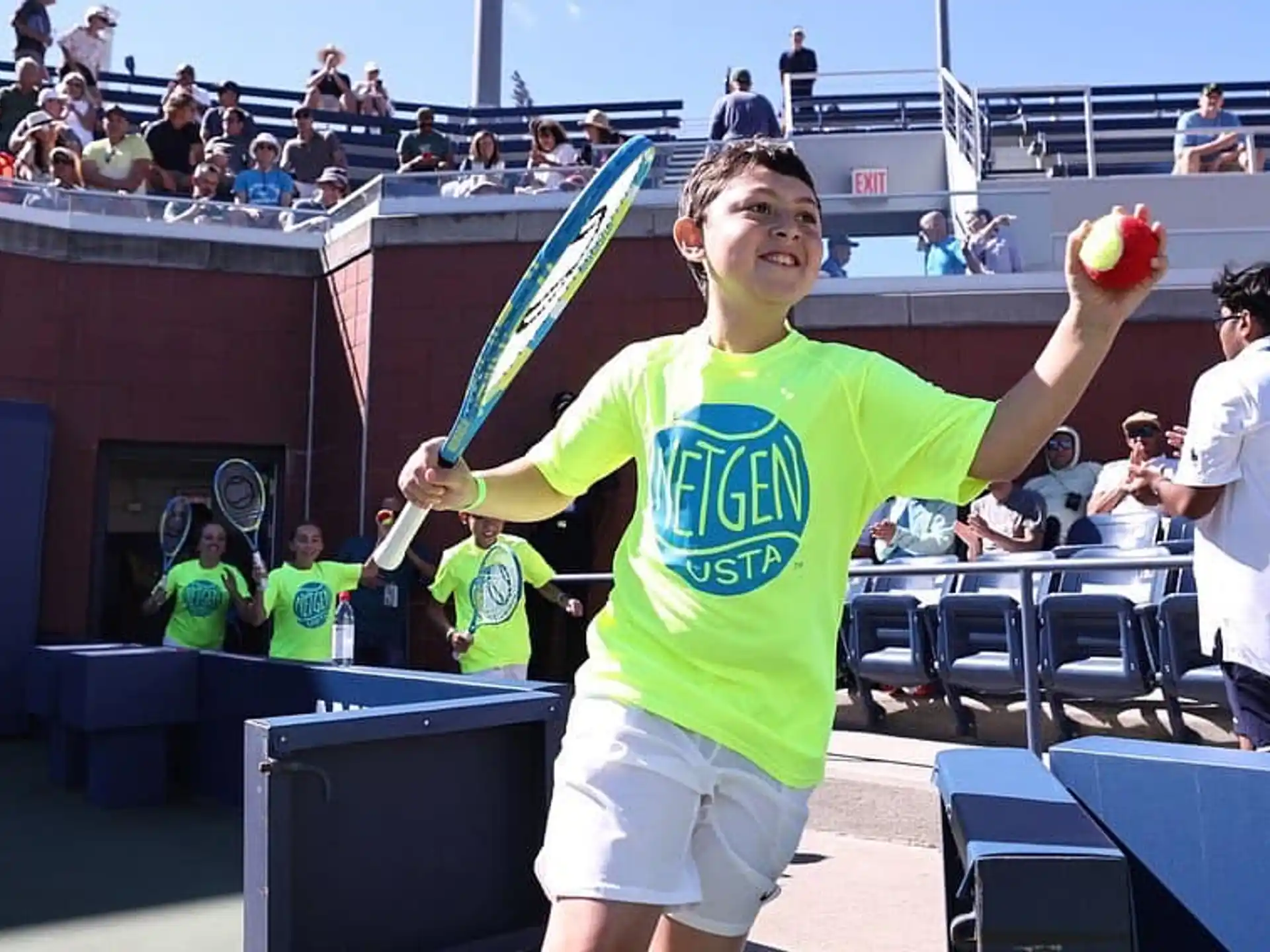 a person holding a tennis racket