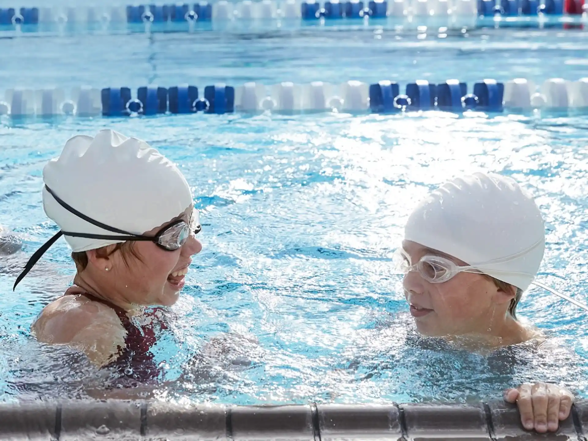 a couple of women in a pool