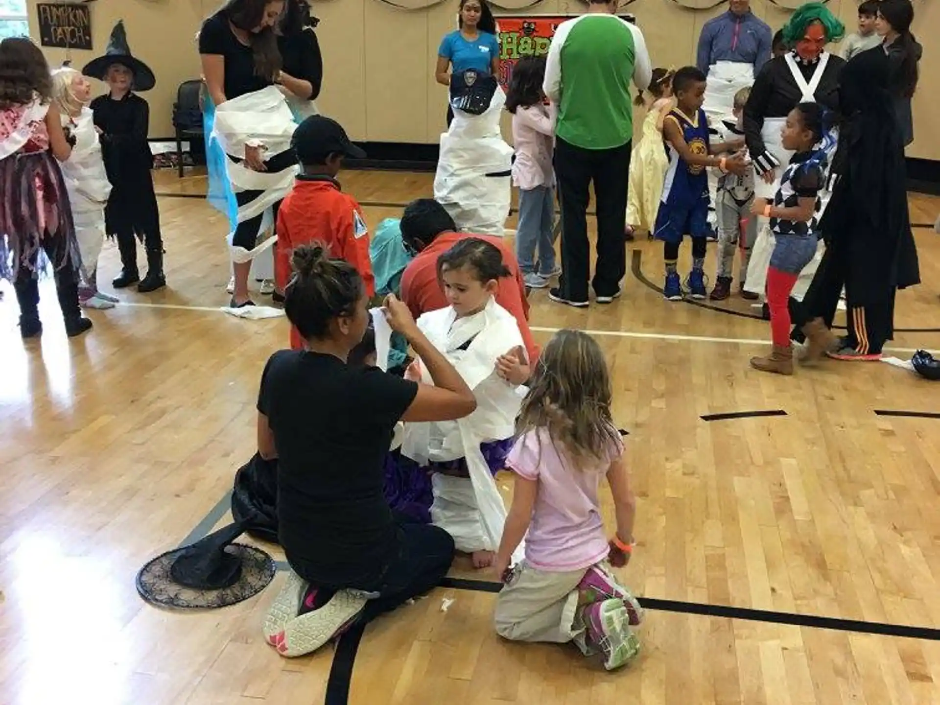 a group of people in a gym