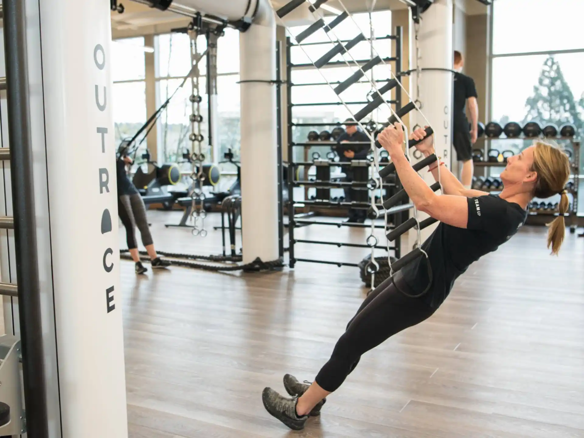 a person lifting weights in a gym