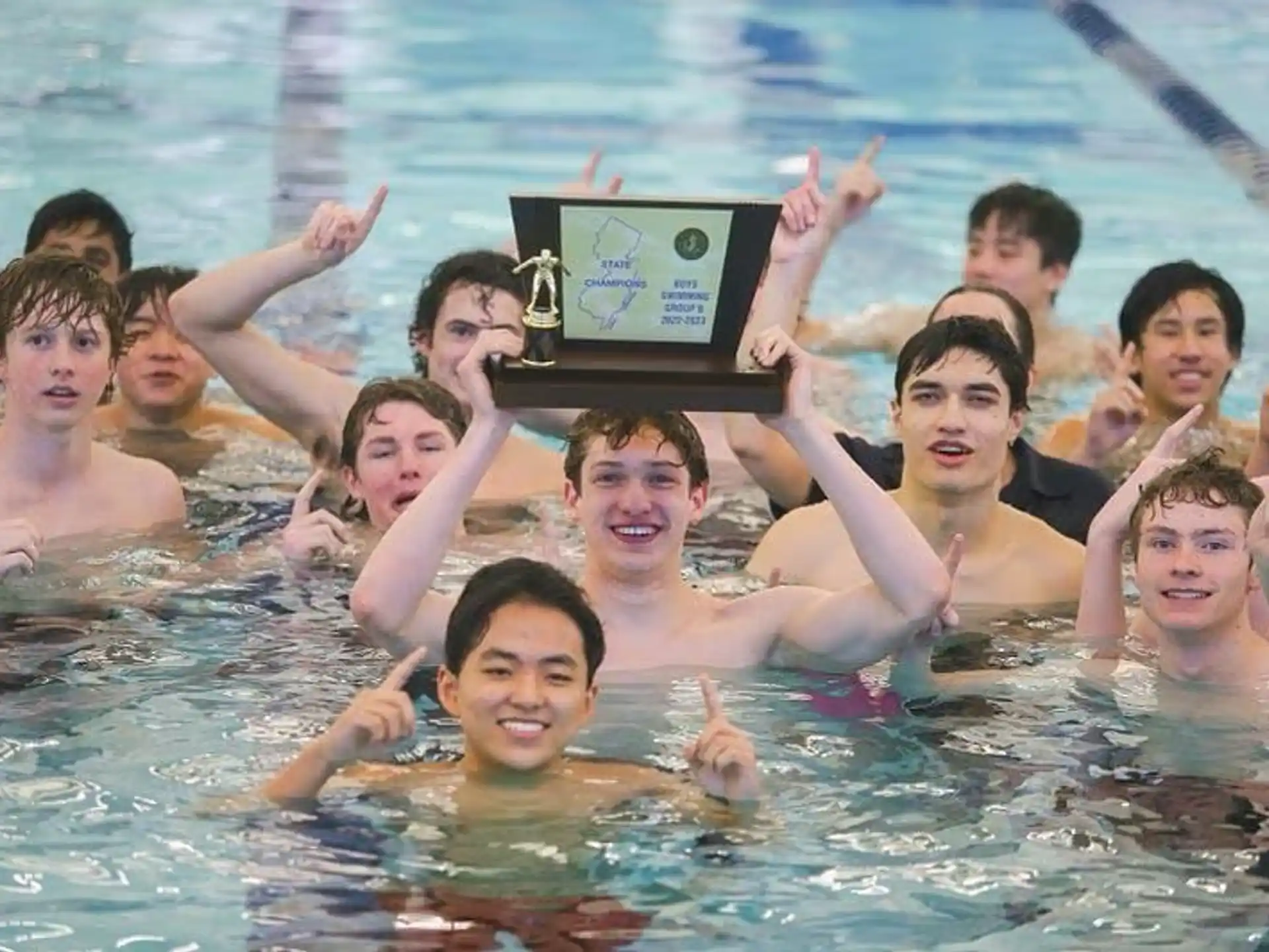a group of people in a pool