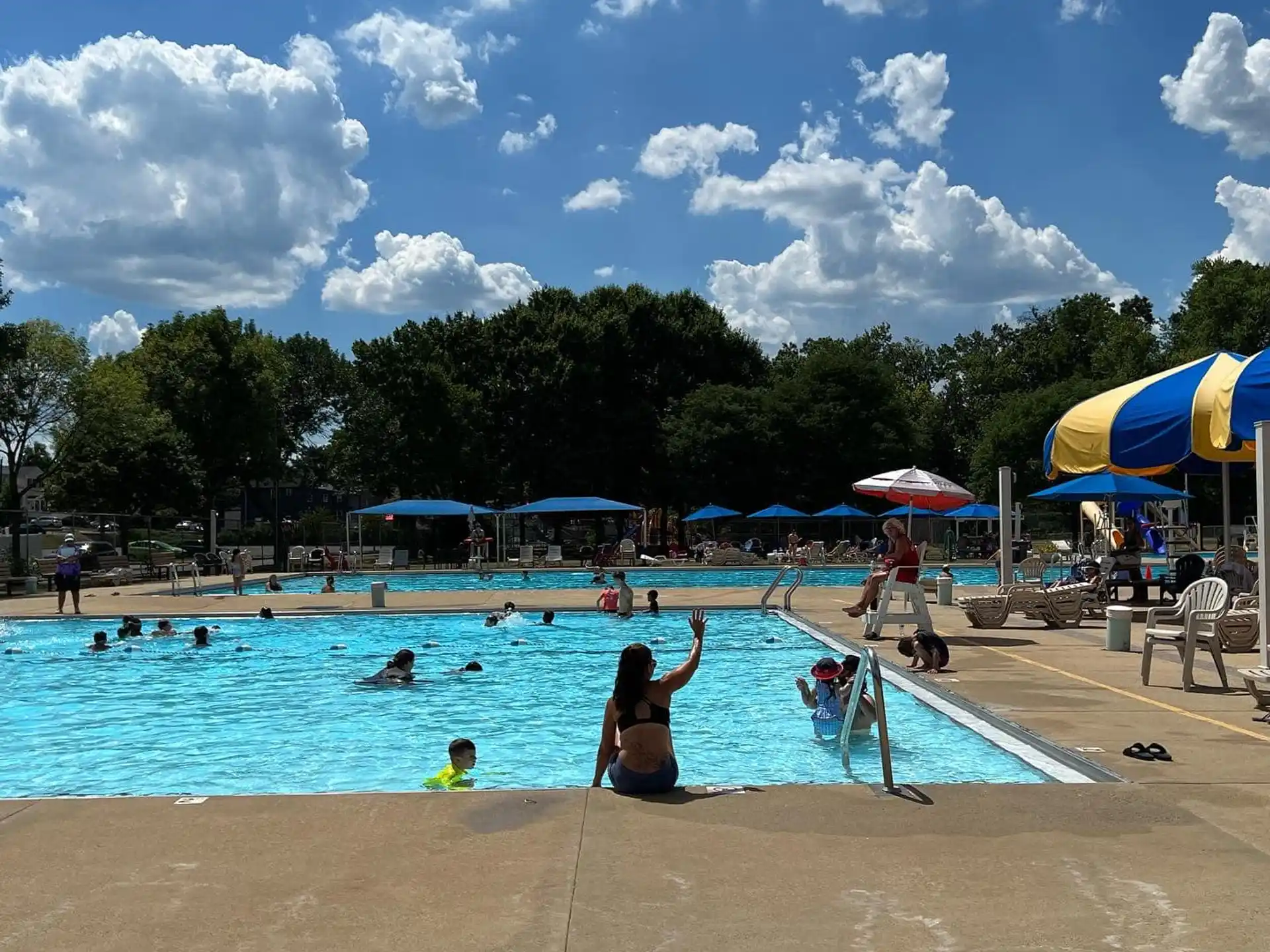 a group of people in a pool
