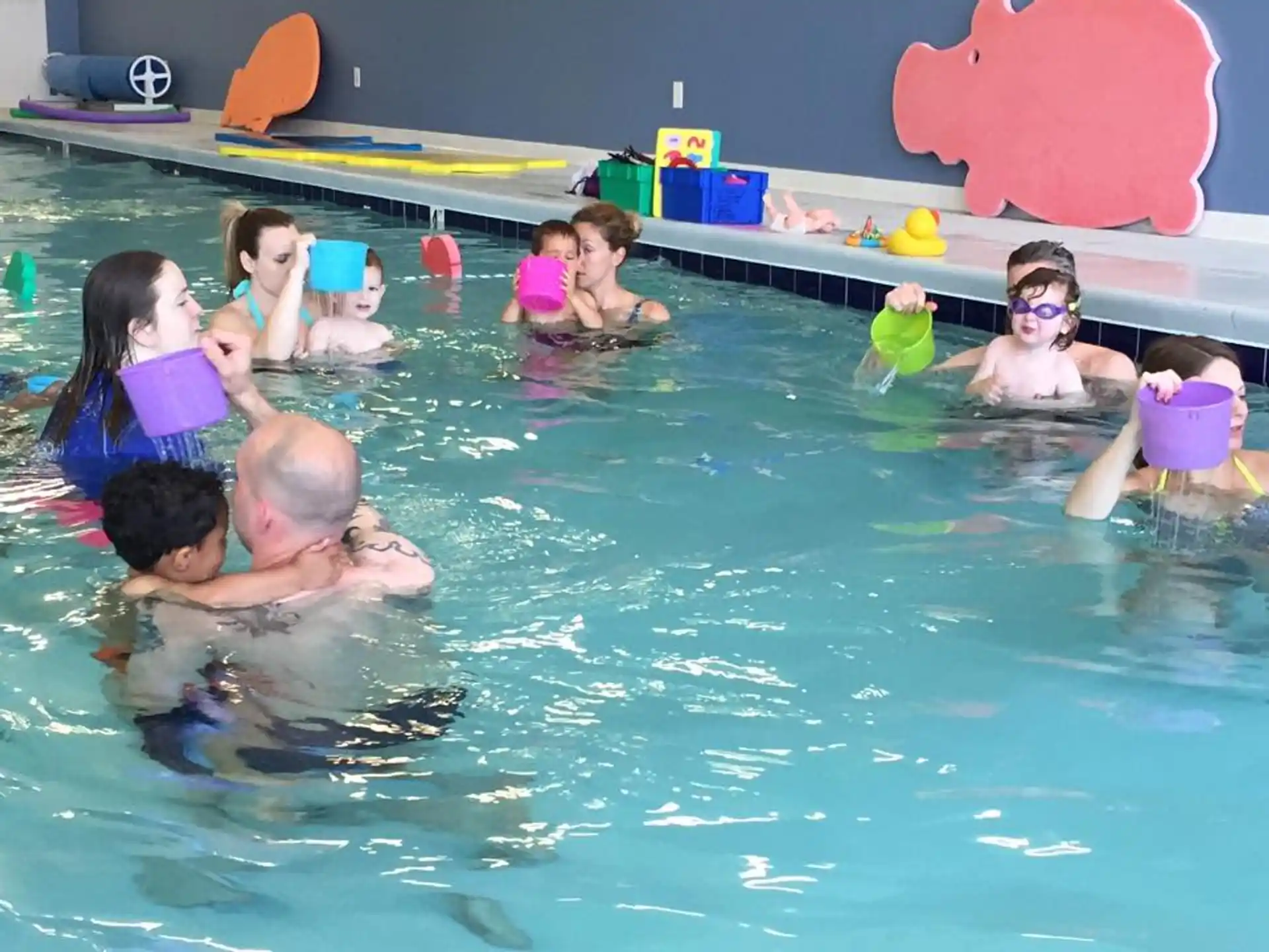 a group of people in a pool