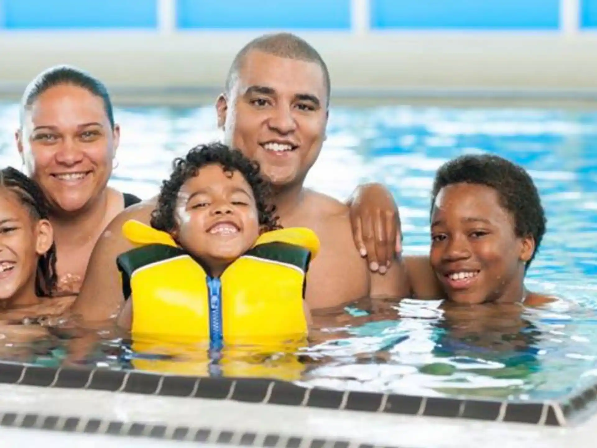 a group of people in a pool