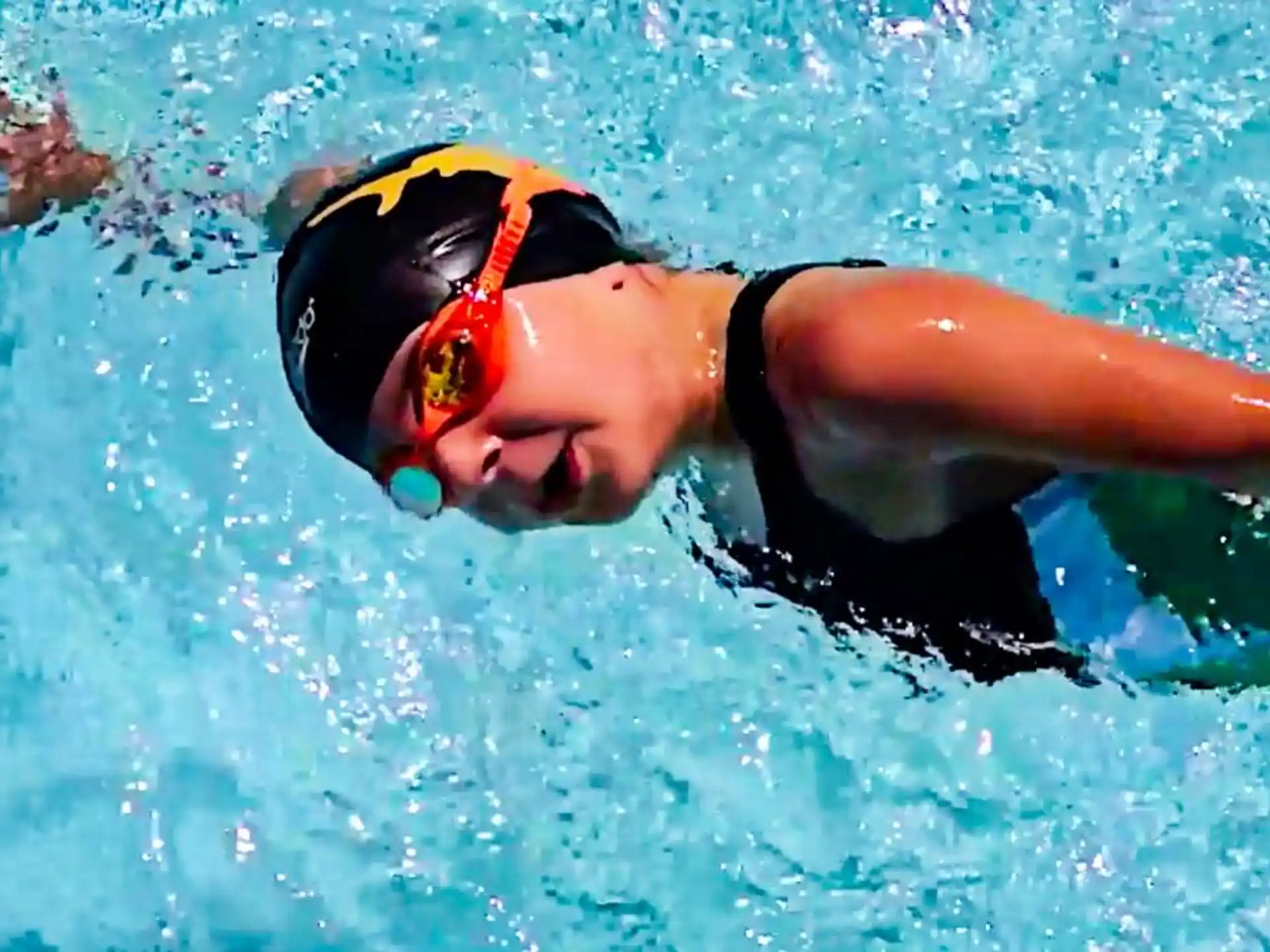 a person swimming in a pool