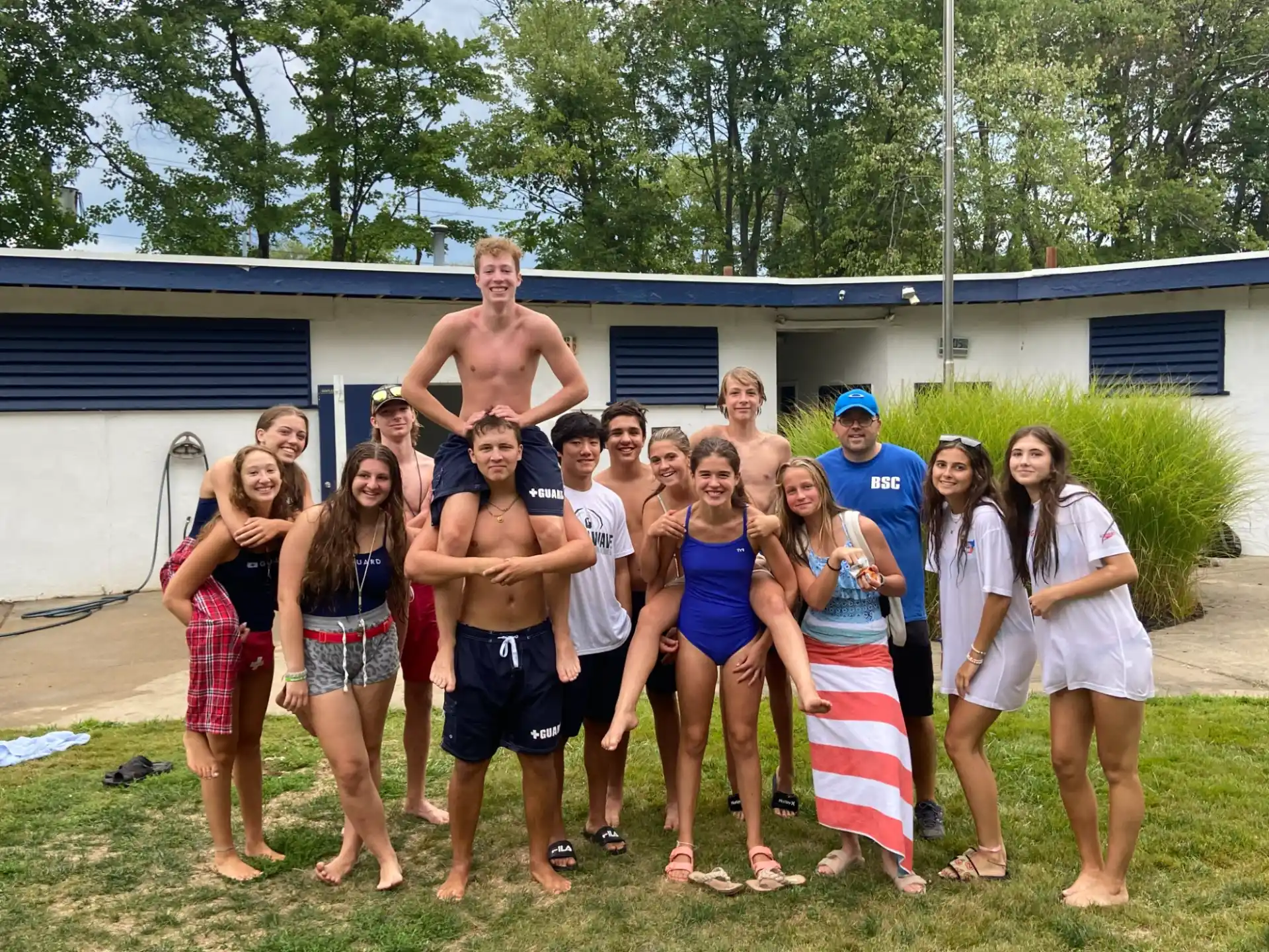 a group of people posing for a photo