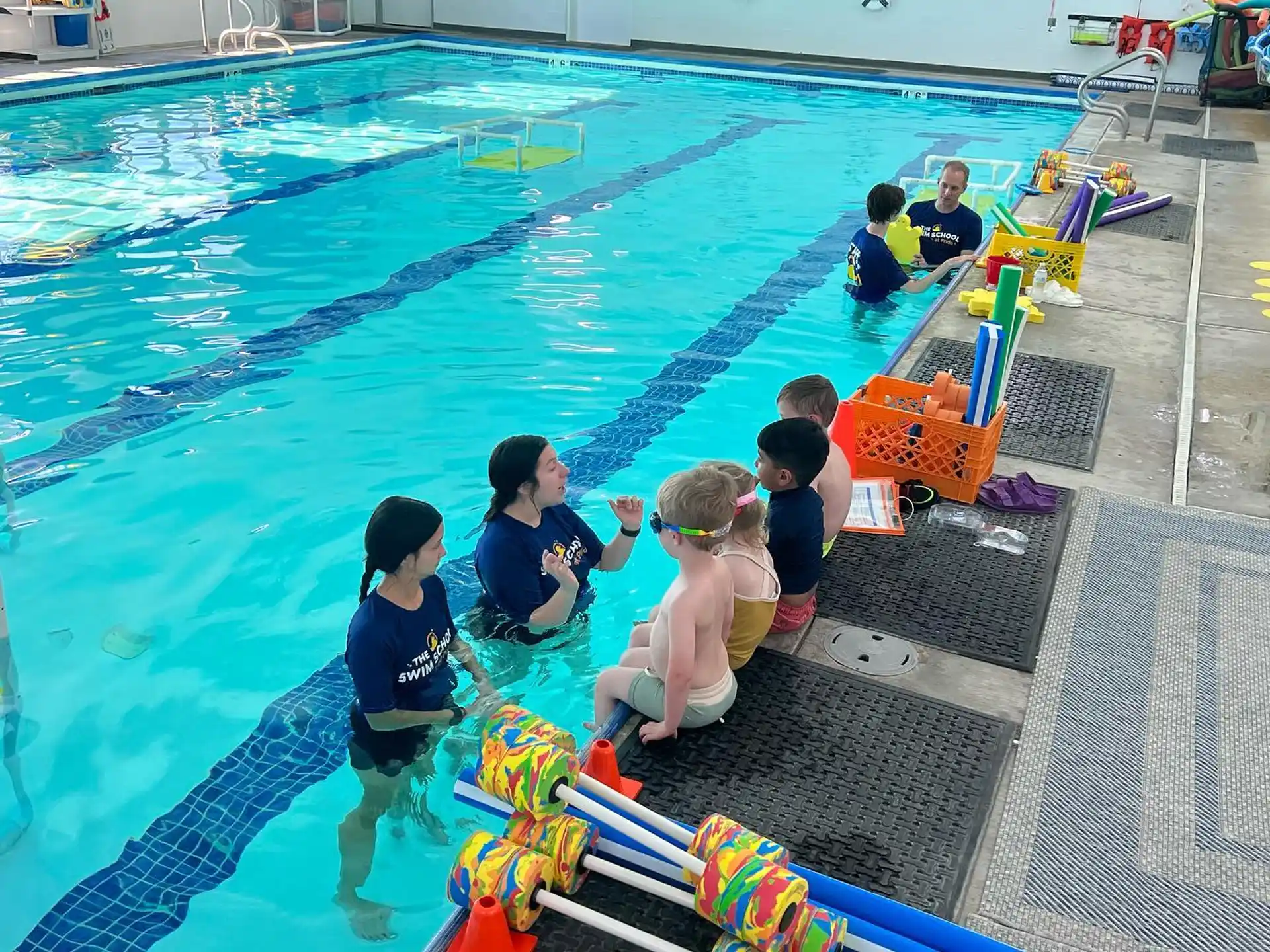 a group of people in a swimming pool