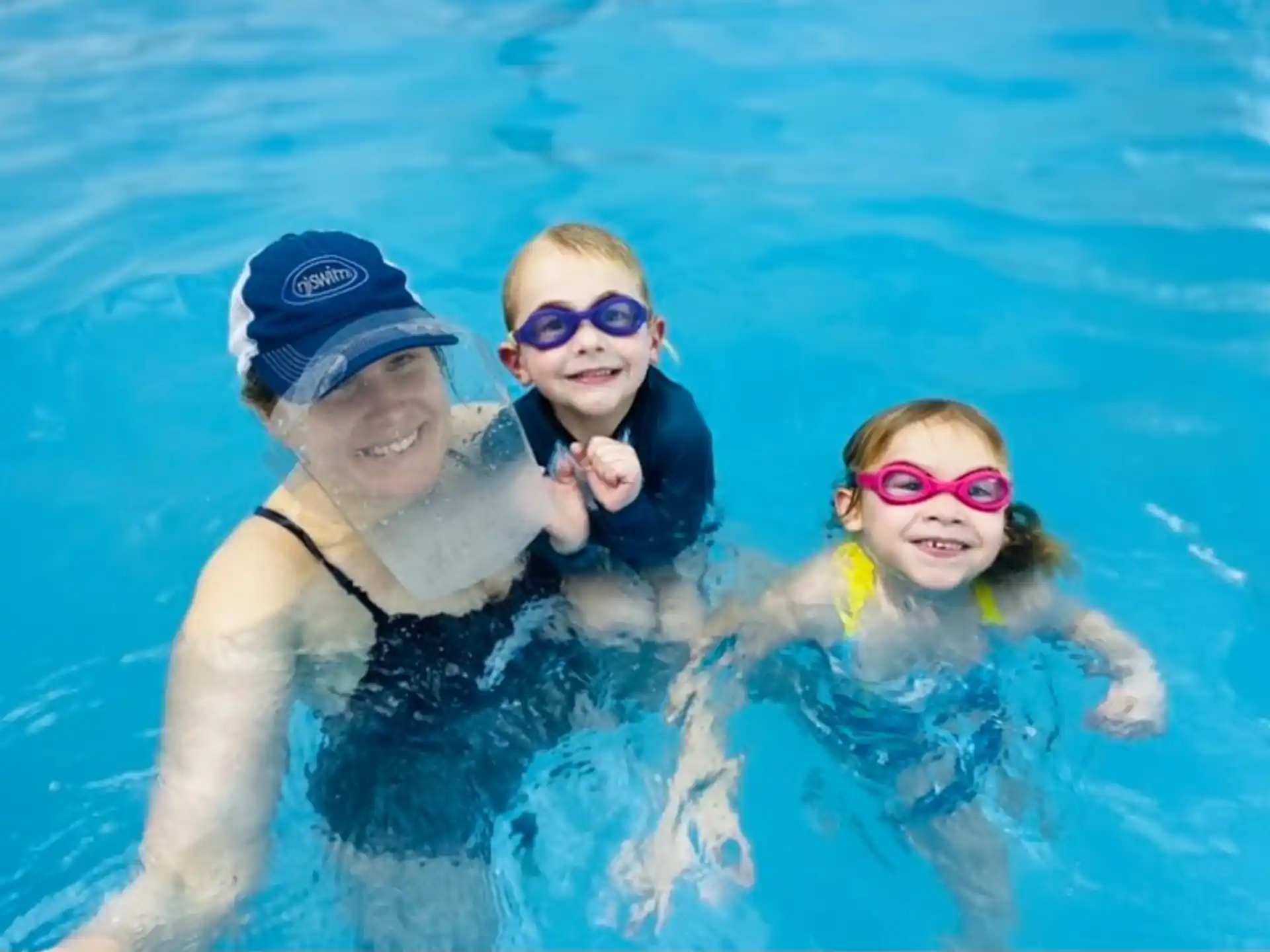 a group of people in a pool