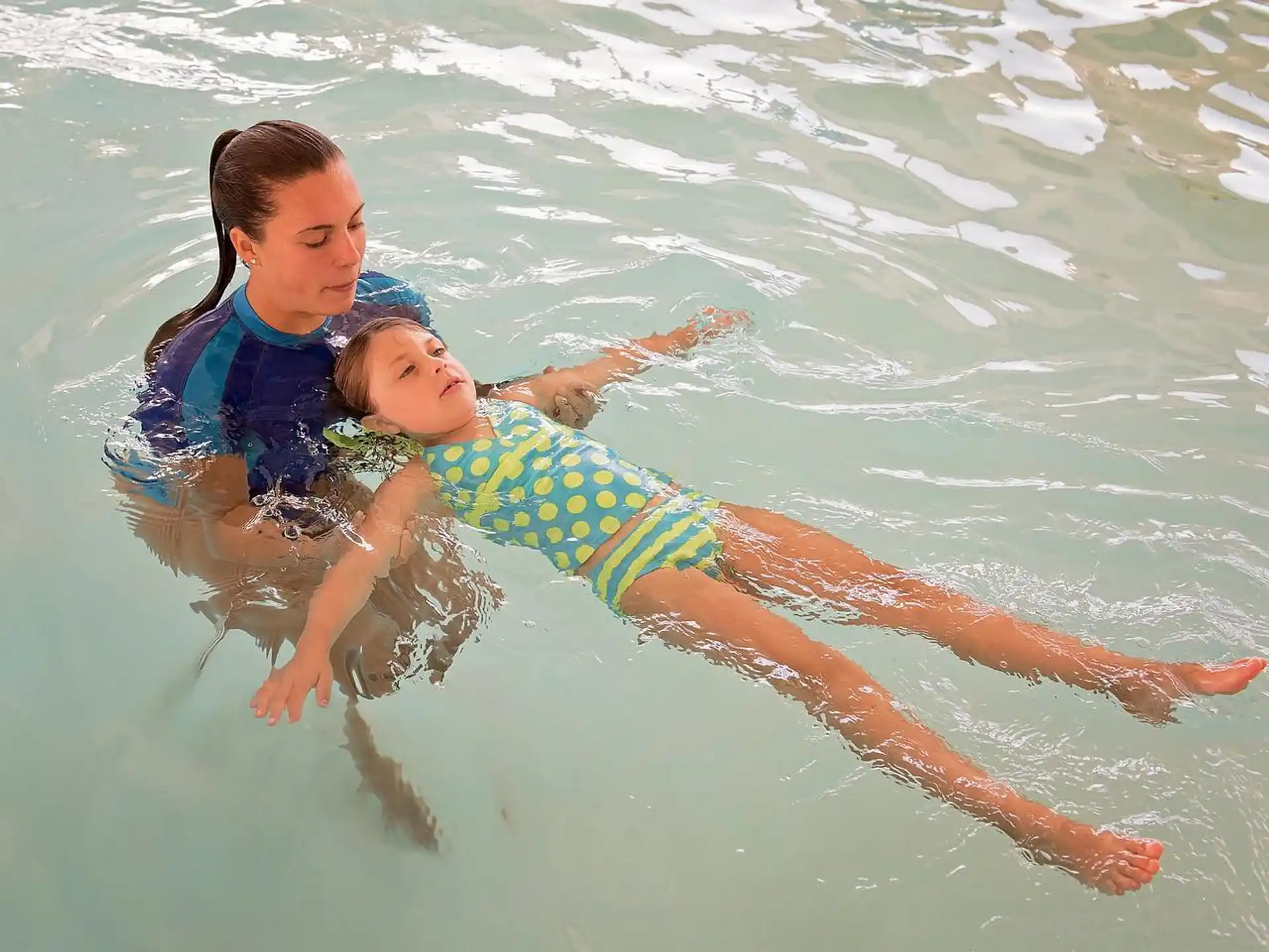 a man and a baby in the water